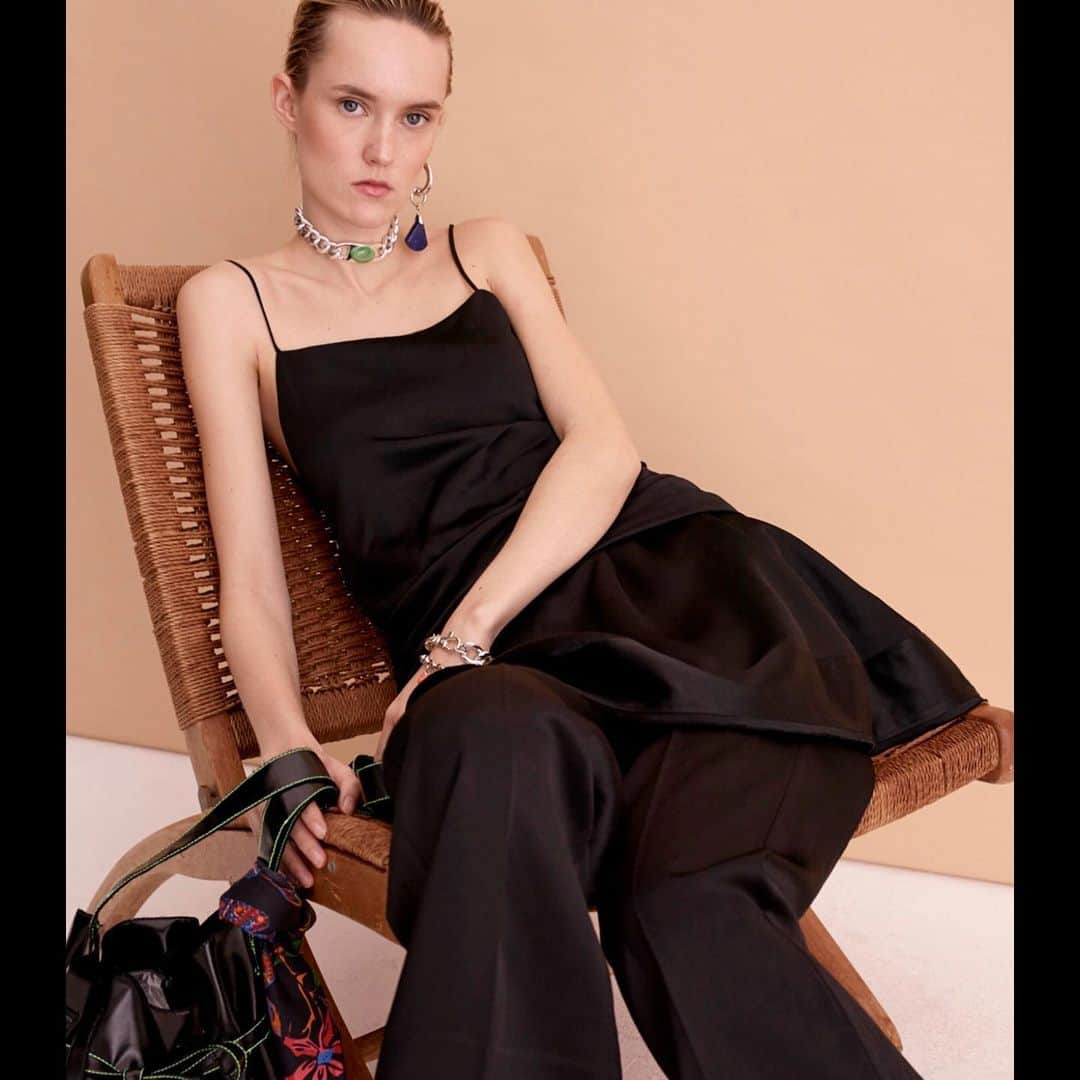 デレク ラムのインスタグラム：「Dressing up with ease. Black satin peplum slip dress over pajama pants.  Derek Lam 10Crosby PF 2019.」