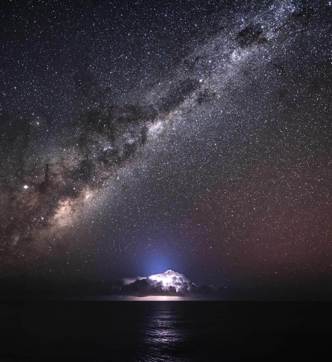 Nikon Australiaさんのインスタグラム写真 - (Nikon AustraliaInstagram)「"It was utterly dark at the new moon, when a distant ocean storm began to flash under the Milky Way. Some faint red airglow to the right of frame sets off the blue glow of lightning just nice too. What a show!” - @willeadesphotography  Camera: Nikon #D850 Lens: AF-S NIKKOR 14-24mm f/2.8G ED (1.7x) Settings: 20s | f/2.8 | ISO ISO 2000  #MyNikonLife #Nikon #NikonAustralia #NikonTop #Photography #DSLR #Nikkor #MyNikkor #NikonPhotography #AstroPhotography #NightPhotography #StormPhotography」7月15日 15時00分 - nikonaustralia