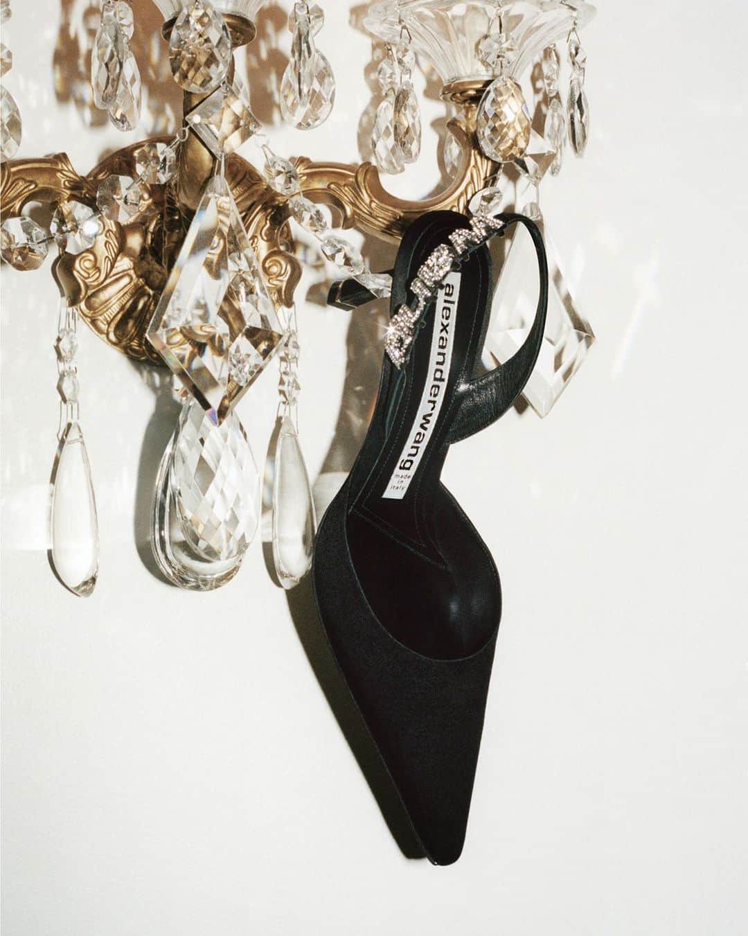 アレキサンダー・ワンのインスタグラム：「She's down to hang. - The Grace satin slingback is available to shop now. Photo by @chris.rhodes.」