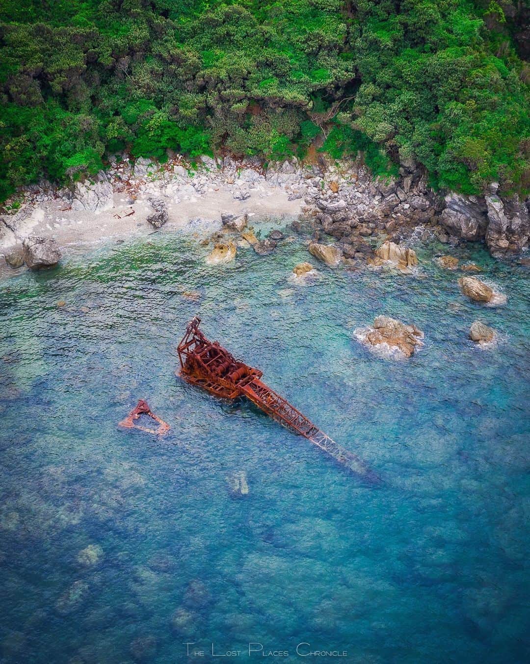 啝 （わ）のインスタグラム：「Abandoned Crane ship stranded on a secret beach 𓆲 𓆲 𓆲 #droneoftheday #djimavicpro #djiglobal #drone #dronephotography #dronestagram #dji #topdronephotos #fromwhereidrone #wedroneasia #droneosoar #skyhilife  #japan_urbex #JJ_URBEX #jp_gallery #kf_urbandonedmasks #KINGS_ABANDONED #m3xtures #Meistershots #moodygrams #nature_takes_over #natures_reclaim #ominous_perfection #pr0ject_uno #rsa_preciousjunk #savethedecay #sfx_decay」