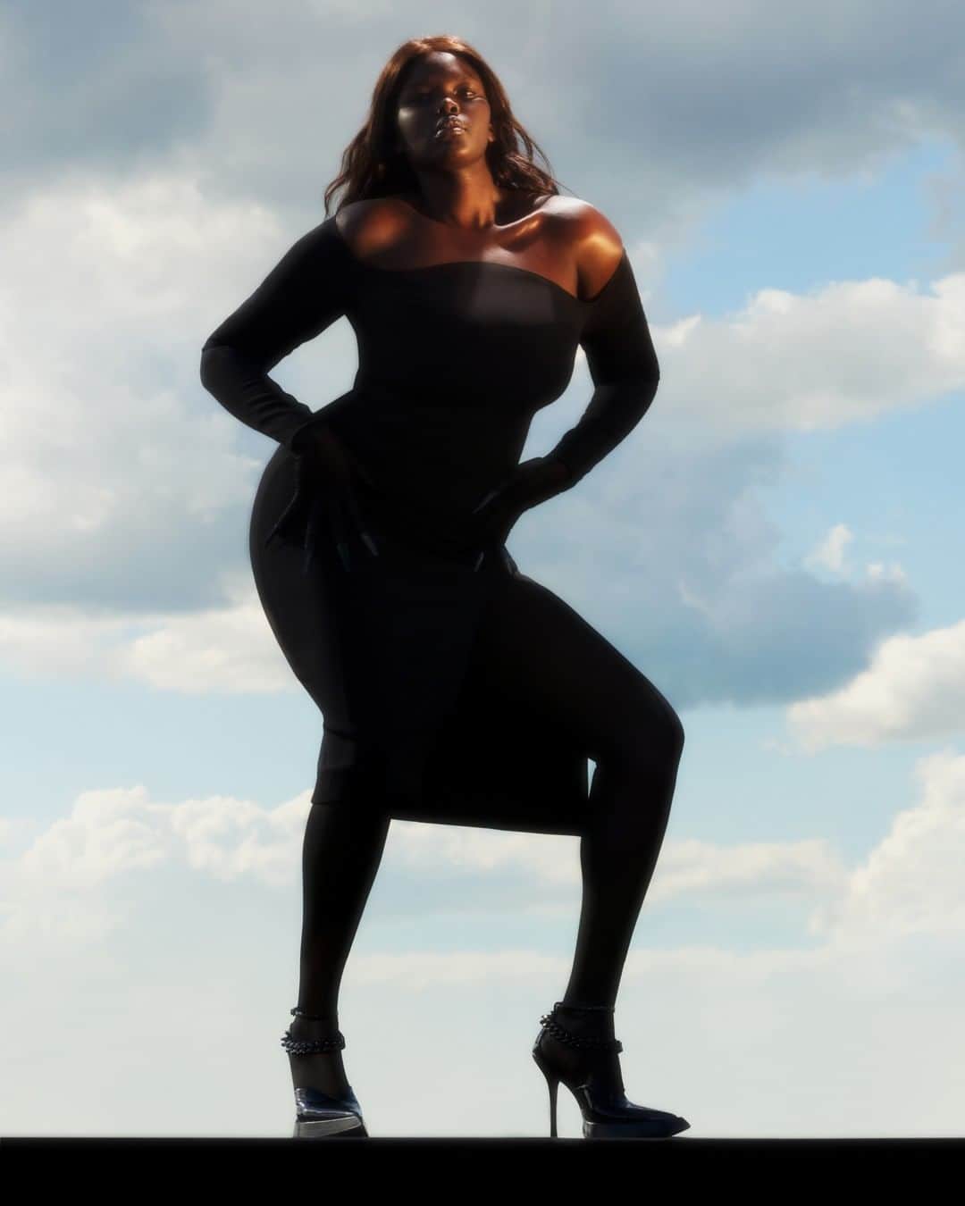 のインスタグラム：「Ariish Wol, sudanese-canadian model and advocate for body diversity based in London, for Mugler Resort 2020. - Ariish wears a black tech sculpting dress with black sheer hosiery, black nail rings and black patent platform pumps. - Creative Director @cadwallader  Styling @alex_jordan_harrington  Photography @arnaudlajeunie  Casting @julialangecasting  Hair @jondefranc  Make up @christinecorbel  Movement @jordandrobson  Production @kitten_production  Model @arrriish #mugler」
