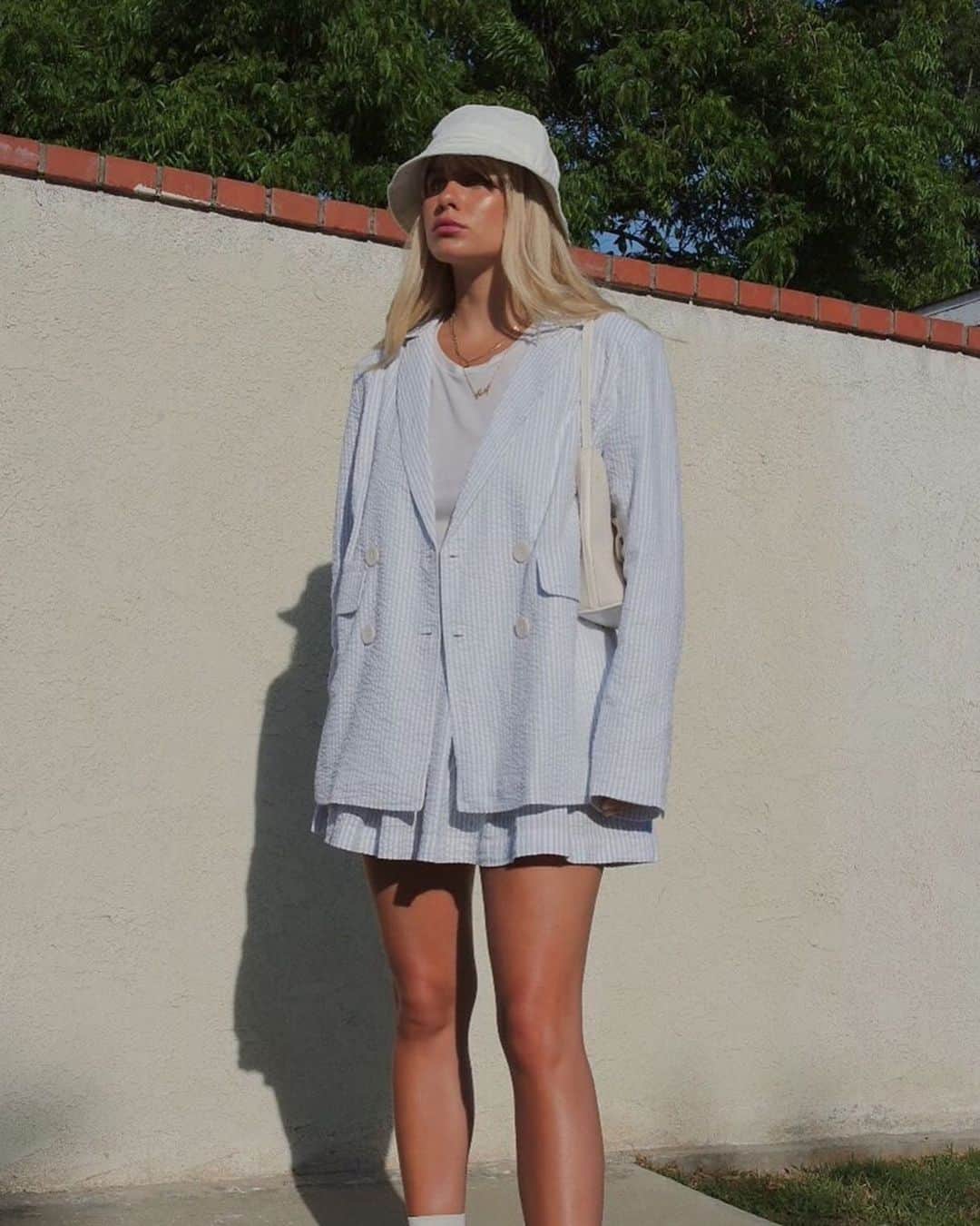 のインスタグラム：「Everything. @courtneeruthie in the UO Love Match blazer and mini skirt. Tap to shop! #UOonYou」
