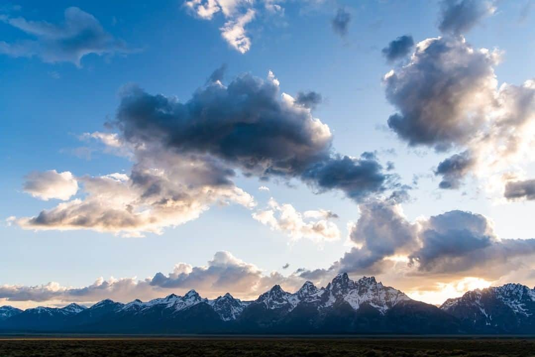 National Geographic Travelさんのインスタグラム写真 - (National Geographic TravelInstagram)「Photo by @taylorglenn | A beautiful evening in the Tetons. June is one of my favorite times of year here in the mountains. The landscape is a brilliant green, snow still caps the high peaks, and sunset light gives it all an incredible atmosphere. Follow me, @taylorglenn, for more from Wyoming and beyond. #grandtetonnationalpark #jacksonhole #Wyoming」6月23日 4時04分 - natgeotravel