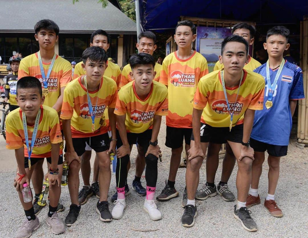 NBC Newsさんのインスタグラム写真 - (NBC NewsInstagram)「Members of the "Wild Boars" football team and their coach pose before participating in a marathon at the visitor centre for the Tham Luang cave, where the 12 boys and their coach were trapped last year. . The marathon marked the one-year anniversary of the start of the two-week ordeal in which the boys were trapped when rain-fed floodwaters pushed them deeper into the cave complex. After their rescue was hailed as nothing short of miraculous, the boys became celebrities, and Netflix has acquired rights to their story. Click the link in our bio for more. . 📷 Jittrapon Kaicome / @afpphoto - @gettyimages」6月24日 2時31分 - nbcnews