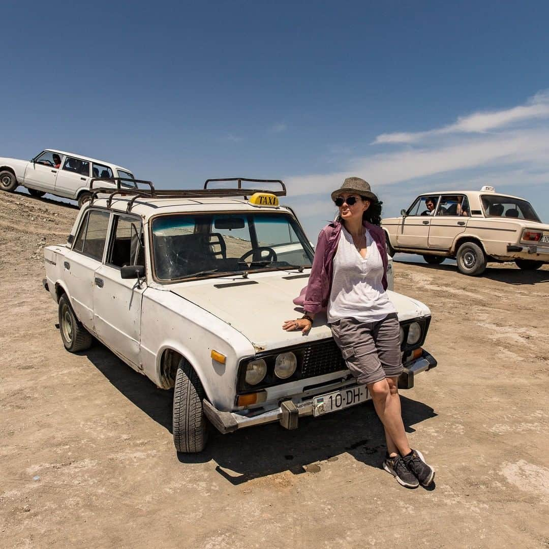 ジュリアナ・デヴァーさんのインスタグラム写真 - (ジュリアナ・デヴァーInstagram)「Whole Lada Vintage Cars⁣ ⁣ Sorry, but how often do you see this many old Soviet-made Ladas in one place besides some, idk, Lada show?⁣ ⁣ Hubs and I rode in these non-shock-absorber-having old bangers to get to the mud volcanoes of Gobustan in Azerbaijan (and maybe took the wheel - check my IG stories).⁣ ⁣ Like staying on a bucking bronco, our trip was noisy, jarring, unpredictable and wild.⁣ ⁣ There are a cadre of older Azeri men that run visitors along an unrelenting stretch of road to from the good roads to the mud volcanoes.⁣ ⁣ As the country of Azerbaijan looks to increase tourism, there is talk of paving these ten miles so coaches can reach the site and guests can ride in comfort. While chiropractors might prefer this, it erases the charm and authentic landscape of getting to such a location. It also puts these Lada drivers out of a job.⁣ ⁣ Is this progress really progress? What do you think?」6月24日 2時45分 - cleverdeverwherever