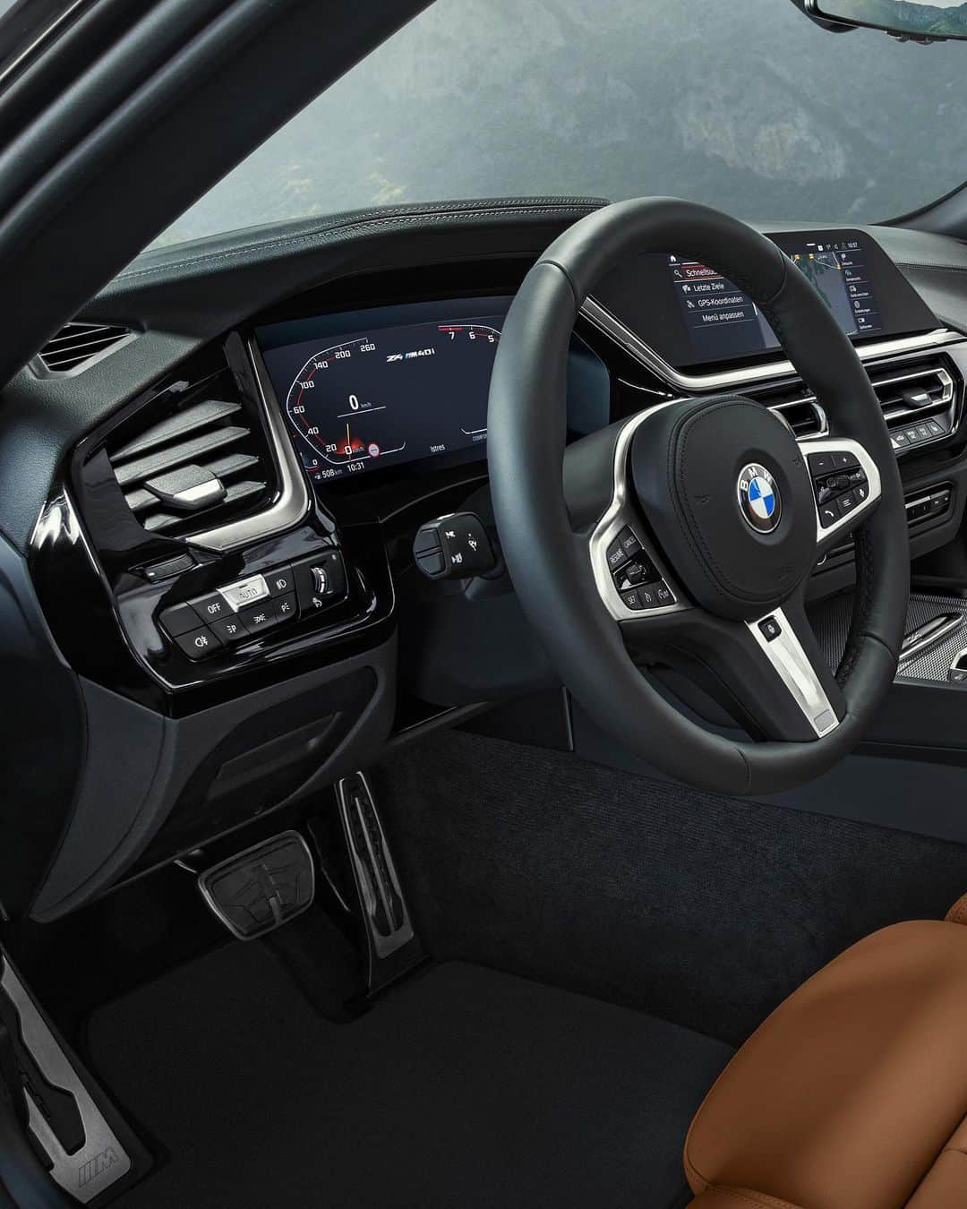 BMWのインスタグラム：「You want to take that seat, don't you? The BMW Z4. #BMW #Z4 __ BMW Z4 M40i: Fuel consumption in l/100 km (combined): 7.4 - 7.1. CO2 emissions in g/km (combined): 168 - 162. The values of fuel consumptions, CO2 emissions and energy consumptions shown were determined according to the European Regulation (EC) 715/2007 in the version applicable at the time of type approval. The figures refer to a vehicle with basic configuration in Germany and the range shown considers optional equipment and the different size of wheels and tires available on the selected model. The values of the vehicles are already based on the new WLTP regulation and are translated back into NEDC-equivalent values in order to ensure the comparison between the vehicles. [With respect to these vehicles, for vehicle related taxes or other duties based (at least inter alia) on CO2-emissions the CO2 values may differ to the values stated here.] The CO2 efficiency specifications are determined according to Directive 1999/94/EC and the European Regulation in its current version applicable. The values shown are based on the fuel consumption, CO2 values and energy consumptions according to the NEDC cycle for the classification. For further information about the official fuel consumption and the specific CO2 emission of new passenger cars can be taken out of the „handbook of fuel consumption, the CO2 emission and power consumption of new passenger cars“, which is available at all selling points and at https://www.dat.de/angebote/verlagsprodukte/leitfaden-kraftstoffverbrauch.html.」