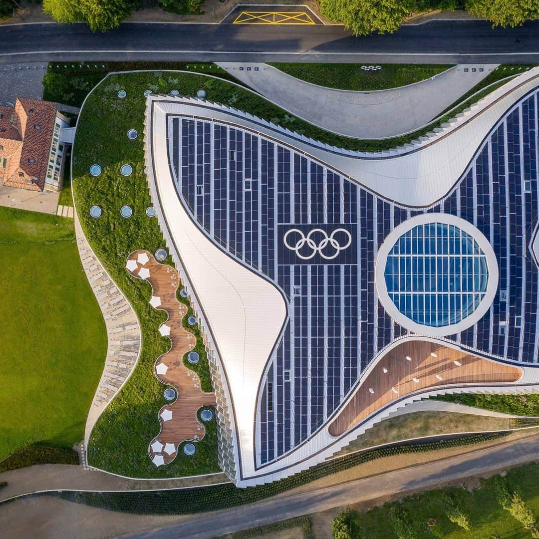 カースティ・コベントリーのインスタグラム：「Olympic House becomes one of the most #sustainable buildings in the world.  The new headquarters of the International Olympic Committee (IOC) has received three of the most rigorous sustainable building certifications. It has therefore become one of the most sustainable buildings in the world.  One of the three certifications is #LEED Platinum, the highest certification level of the international LEED green building programme. According to the U.S. Green Building Council (USGBC), the organisation that developed LEED, Olympic House has received the most points (93) of any LEED v4-certified new construction project to date.  Did you know?  The Olympic House has been designed around the 4 concepts of #Integration (into the natural landscape), #Peace (solar panels on the roof representing a dove), #Athletes at the heart (shape inspired by movement), and #Unity (five-ring central staircase)  The IOC is committed to sustainability as 95% of former buildings' materials was #reused or #recycled  12,000 tonnes of concrete that was crushed on site and reused in the foundations of the new building.  95% of waste produced during the construction of the Olympic House was recycled.  #olympichouse #olympics #sport #lausanne #switzerland」