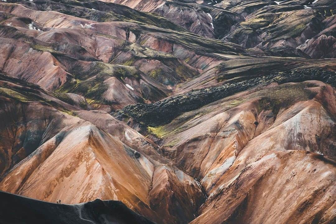 National Geographic Travelさんのインスタグラム写真 - (National Geographic TravelInstagram)「Photo by @mborowick | Hikers can be seen starting to climb the Bláhnúkur mountain trail (Blue Peak Mountain) which is one of the most popular day treks in Landmannalaugar. The Icelandic highlands are home to some incredible geological landscape. #iceland #nature #hiking #earth #explorer」6月24日 16時14分 - natgeotravel