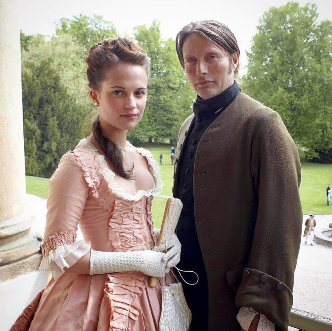 アリシア・ヴィキャンデルのインスタグラム：「Alicia Vikander and Mads Mikkelsen on set of A Royal Affair (2012). In my opinion this is one of Alicia’s best films, do you agree?」