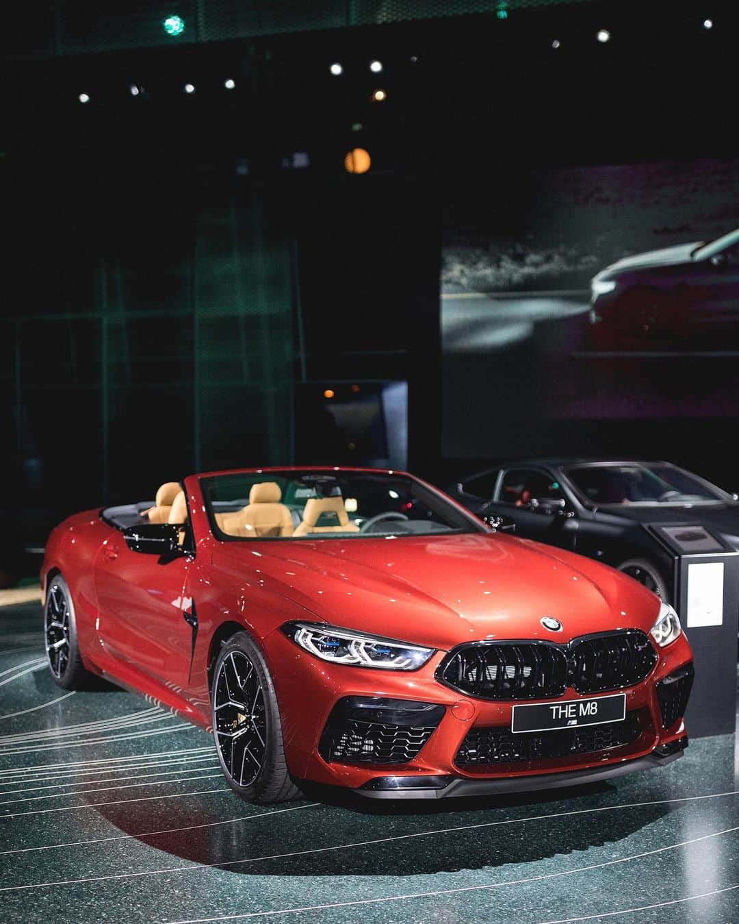 BMWのインスタグラム：「World premiere of an exceptional performance. The first-ever BMW M8 Competition Convertible at the #NEXTGen. Stay tuned for more exciting news. #TheM8 #BMW #BMWM __ BMW M8 Competition Convertible: Fuel consumption in l/100 km (combined): 10.8 - 10.6. CO2 emissions in g/km (combined): 246 - 241. The values of fuel consumptions, CO2 emissions and energy consumptions shown were determined according to the European Regulation (EC) 715/2007 in the version applicable at the time of type approval. The figures refer to a vehicle with basic configuration in Germany and the range shown considers optional equipment and the different size of wheels and tires available on the selected model. The values of the vehicles are already based on the new WLTP regulation and are translated back into NEDC-equivalent values in order to ensure the comparison between the vehicles. [With respect to these vehicles, for vehicle related taxes or other duties based (at least inter alia) on CO2-emissions the CO2 values may differ to the values stated here.] The CO2 efficiency specifications are determined according to Directive 1999/94/EC and the European Regulation in its current version applicable. The values shown are based on the fuel consumption, CO2 values and energy consumptions according to the NEDC cycle for the classification. For further information about the official fuel consumption and the specific CO2 emission of new passenger cars can be taken out of the „handbook of fuel consumption, the CO2 emission and power consumption of new passenger cars“, which is available at all selling points and at https://www.dat.de/angebote/verlagsprodukte/leitfaden-kraftstoffverbrauch.html.」