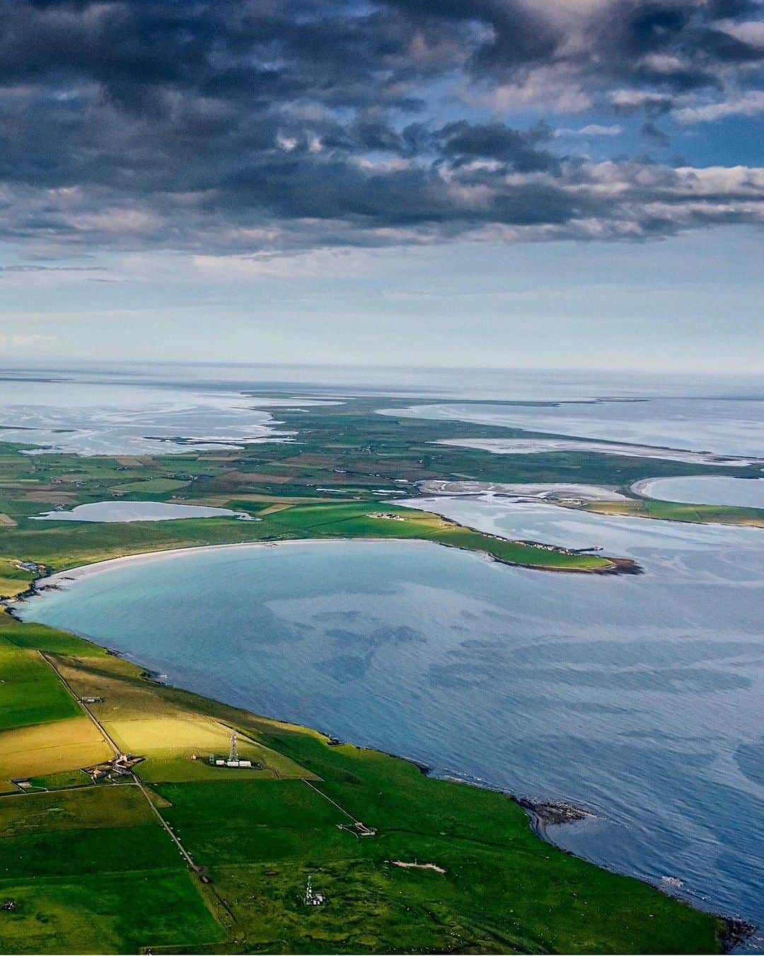 National Geographic Travelさんのインスタグラム写真 - (National Geographic TravelInstagram)「Photo by @jimrichardsonng | Sanday, one of the islands of Orkney, sprawls across the North Sea, a convoluted combination of low land, beaches, and tidal flats which are in constant flux. Neolithic farmers liked the rich farmland and long summer days. Orkney farmers today still do. The sea between the islands is generally very shallow, so the actual landscape of the Neolithic era may well have been much different, depending on the rapidly rising sea level. Vikings, too, favored Orkney, adding rich layers of history and lore. Follow me, @jimrichardsonng, for more Scotland. #scotland #orkney」6月26日 4時36分 - natgeotravel