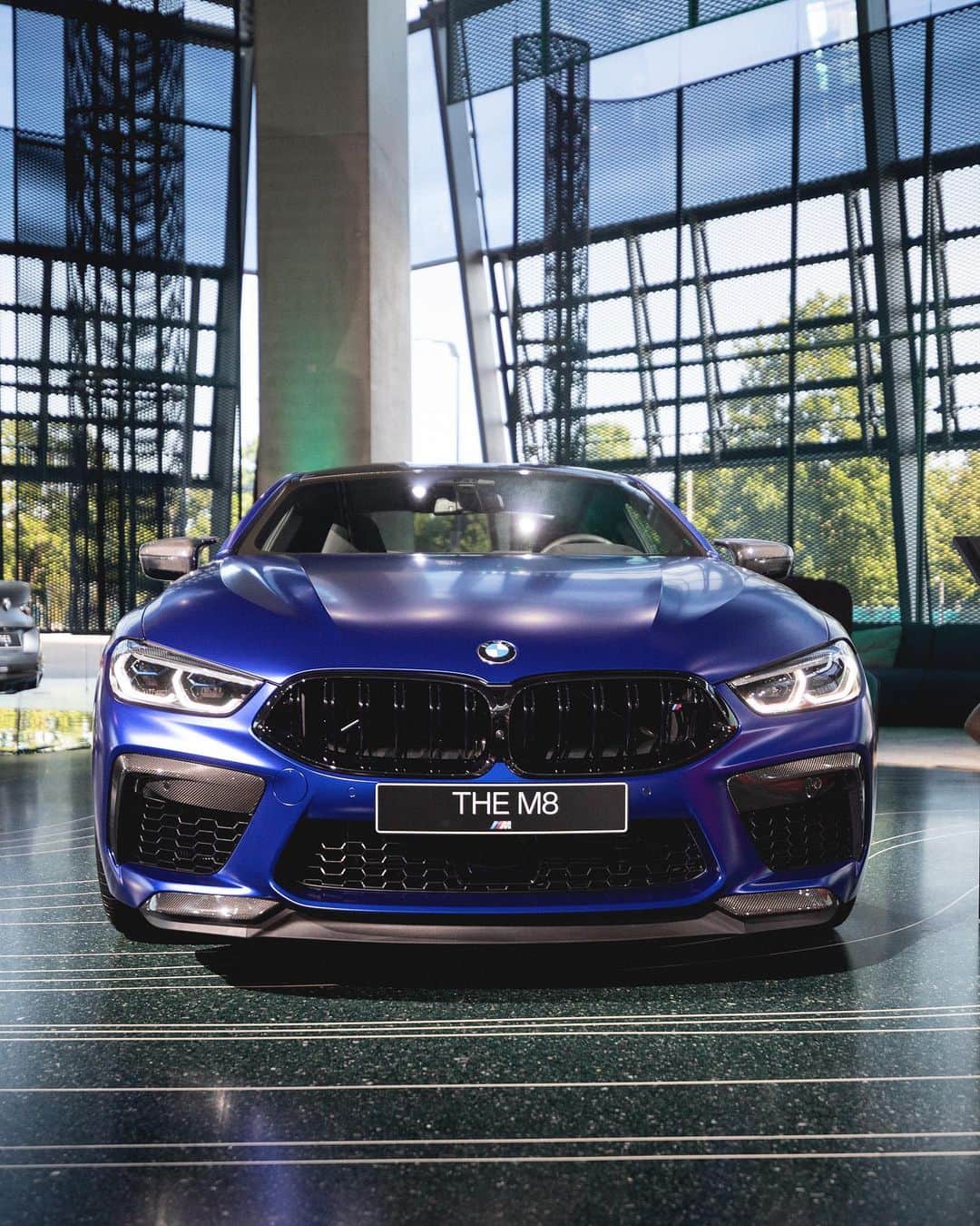 BMWのインスタグラム：「Embark on a luxurious mission.  The first-ever BMW M8 Competition Coupé at #NEXTGen. Stay tuned for more news. #TheM8 #BMW #BMWM  __ BMW M8 Competition Coupé: Fuel consumption in l/100 km (combined): 10.6 - 10.5. CO2 emissions in g/km (combined): 242 - 238. The values of fuel consumptions, CO2 emissions and energy consumptions shown were determined according to the European Regulation (EC) 715/2007 in the version applicable at the time of type approval. The figures refer to a vehicle with basic configuration in Germany and the range shown considers optional equipment and the different size of wheels and tires available on the selected model. The values of the vehicles are already based on the new WLTP regulation and are translated back into NEDC-equivalent values in order to ensure the comparison between the vehicles. [With respect to these vehicles, for vehicle related taxes or other duties based (at least inter alia) on CO2-emissions the CO2 values may differ to the values stated here.] The CO2 efficiency specifications are determined according to Directive 1999/94/EC and the European Regulation in its current version applicable. The values shown are based on the fuel consumption, CO2 values and energy consumptions according to the NEDC cycle for the classification. For further information about the official fuel consumption and the specific CO2 emission of new passenger cars can be taken out of the „handbook of fuel consumption, the CO2 emission and power consumption of new passenger cars“, which is available at all selling points and at https://www.dat.de/angebote/verlagsprodukte/leitfaden-kraftstoffverbrauch.html.」