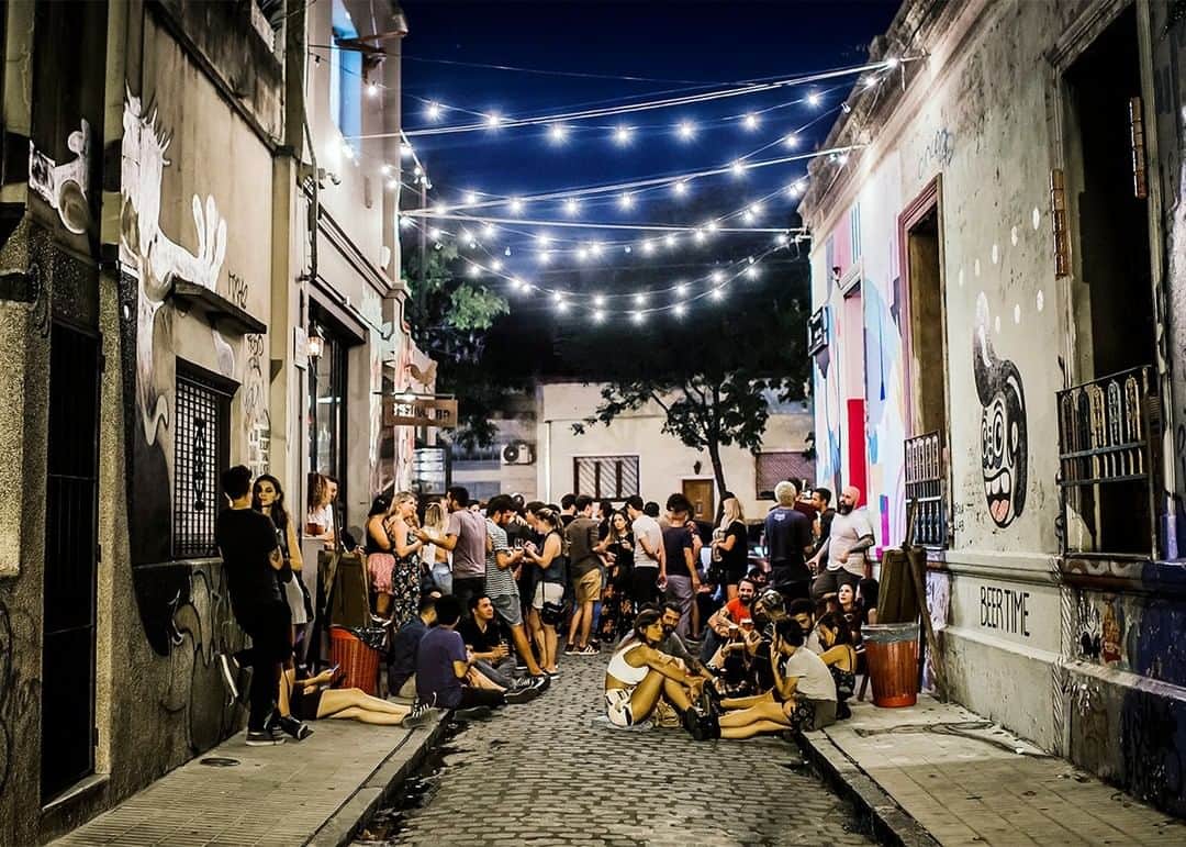 National Geographic Travelさんのインスタグラム写真 - (National Geographic TravelInstagram)「Photo by @dina_litovsky | The District of Palermo in Buenos Aires is known for its vibrant nightlife that stretches into the early morning hours. It's fun to walk through it at night and stumble onto scenes like this, people taking over the cobblestone streets to unwind after a long day. Follow me at @dina_litovsky for more images around the world.」6月26日 7時00分 - natgeotravel