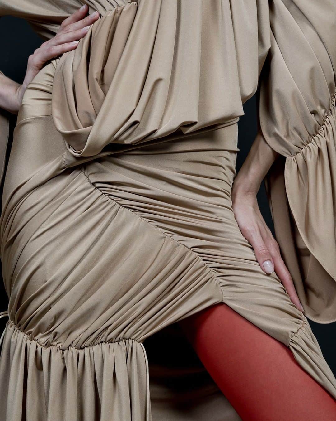 のインスタグラム：「Mugler Resort 2020 nude hyper gathered jersey dress with red sheer hosiery. - - Visual @studio.m.antwerp  #mugler」
