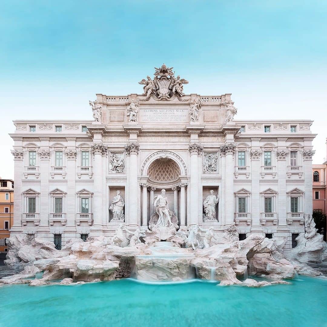 エールフランスのインスタグラム：「When the blue sky reflects onto an even bluer Fontana di Trevi, and you can feel the vibrant Italian sun on your cheeks. A Roman escapade at its best.  Quand l’azur céleste se confond avec le bleu de la Fontaine de Trevi, et que sur vos joues se posent les rayons du soleil italien. Une escapade romaine.  #AirFrance #Franceisintheair」