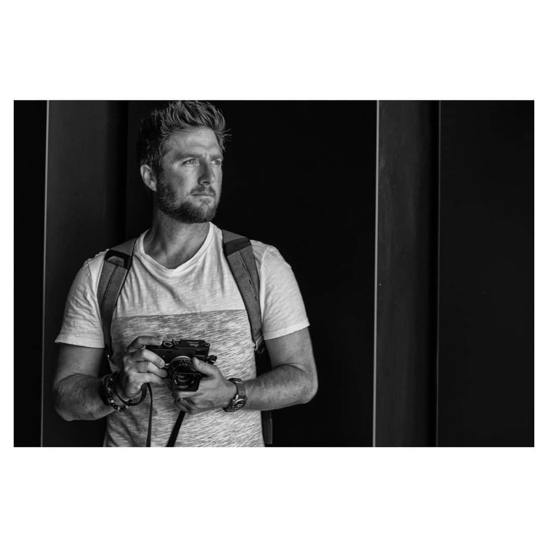 Pete Halvorsenのインスタグラム：「It me 🧐. . Had such a fulfilling week with my Leica family in Germany. Made some new friends and got to catch up with some old ones. . Thank you to @chris_michel for capturing me in a totally natural moment scanning the horizon for my next photo 😆😅 And special thanks to @leicacamerausa for inviting me out to Wetzlar, always a special experience.  #LeicaM10」
