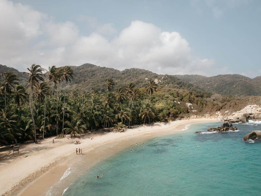 National Geographic Travelさんのインスタグラム写真 - (National Geographic TravelInstagram)「Photo by @kevinfaingnaert | Parque Nacional Natural Tayrona is a magical slice of Colombia's Caribbean coast, with stunning stretches of golden, sandy beach backed by coconut palms and thick rainforest. Behind it all rise the steep hillsides of the Sierra Nevada de Santa Marta, the world's highest coastal mountain range.」6月30日 4時01分 - natgeotravel