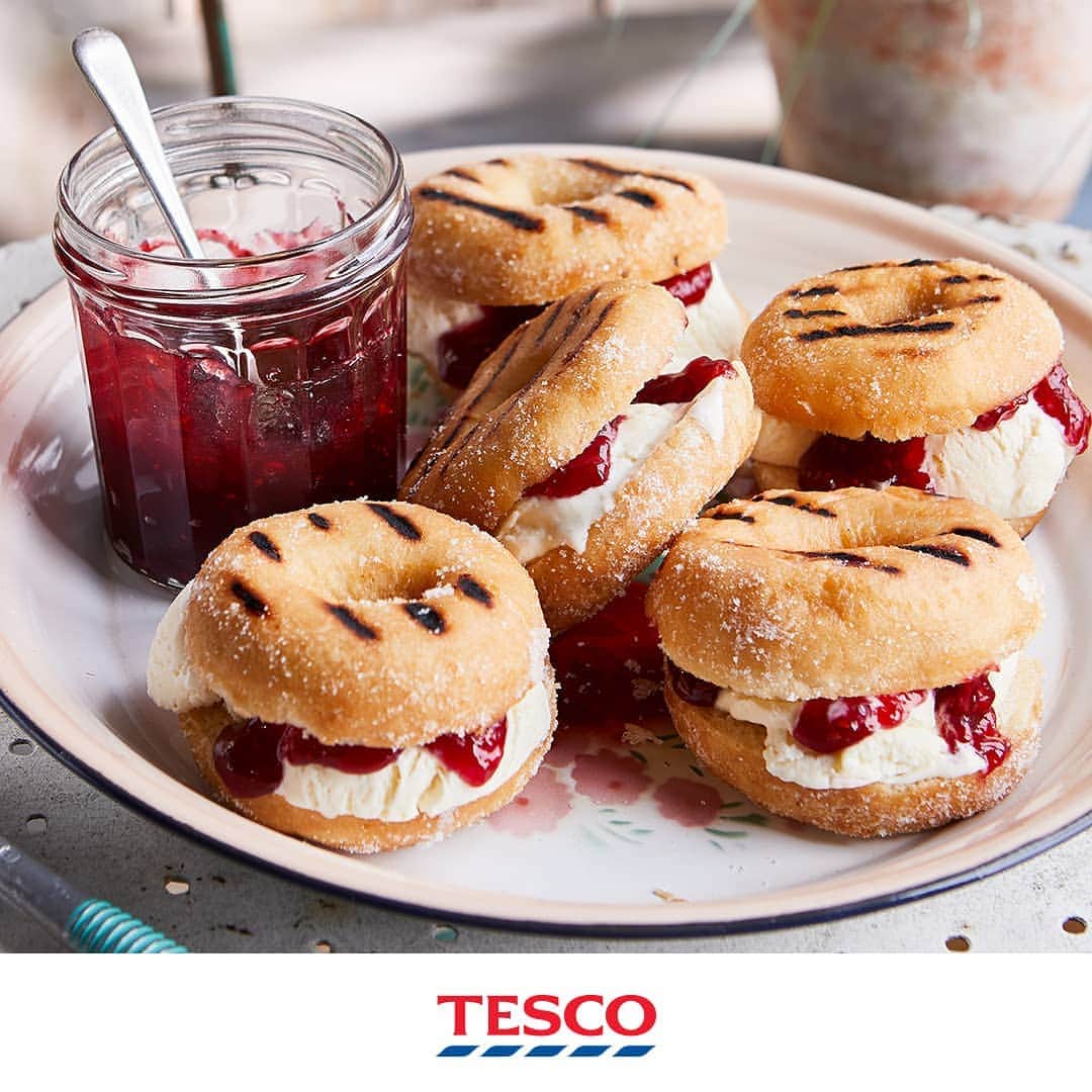 Tesco Food Officialさんのインスタグラム写真 - (Tesco Food OfficialInstagram)「Want a sweet end to an epic BBQ? Have a cookout with doughnut ice cream sandwiches - just throw store-bought doughnuts on the grill, then sandwich them back together with jam and cool ice cream.  Ingredients 5 ring doughnuts 400g vanilla ice cream 200g raspberry jam  Method Heat your barbecue to high. Slice the doughnuts in half. Place on the barbecue, outsides down – cook towards the edges of the barbecue, as this uses indirect heat so the doughnuts don't burn. Barbecue for 2-3 mins until there are clear griddle lines on the outsides of the doughnuts. Use tongs to remove from the heat, place on a tray and leave to cool slightly. While the doughnuts are cooking, take the ice cream out of the freezer to soften for 10 mins. Add 2-3 small scoops of ice cream to the bottom half of each doughnut and evenly spread it around the ring. Spread each top half with a thin layer of raspberry jam and press down lightly to squeeze the ice cream to the sides. Serve immediately.」6月30日 19時05分 - tescofood