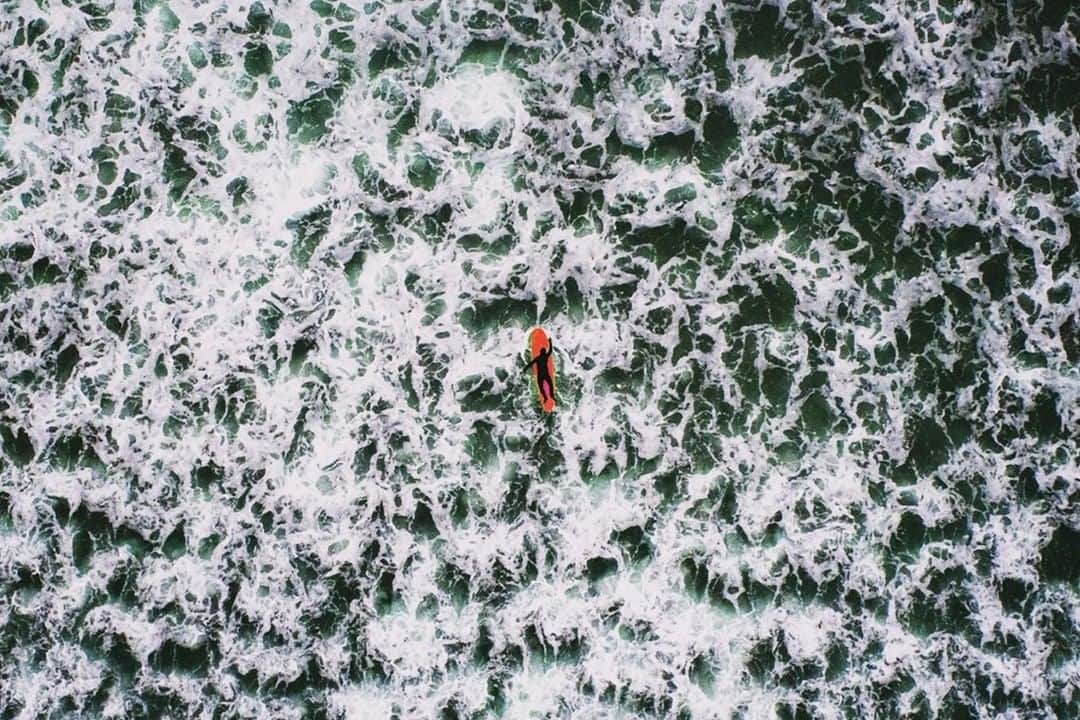 National Geographic Travelさんのインスタグラム写真 - (National Geographic TravelInstagram)「Photo by @mborowick | A surfer paddles out into the Pacific Ocean to catch a wave on a brisk morning in Southwestern Canada. #surfing #ocean #nature #canada #explore」7月1日 13時13分 - natgeotravel