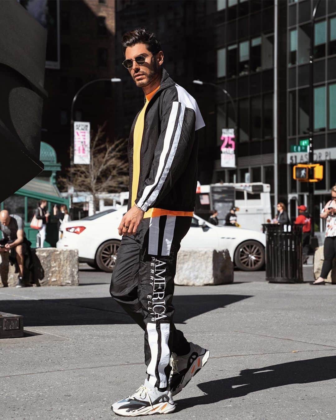 ペリーエリスのインスタグラム：「America is where it's at. @joeyzauzig hit the streets of New York in a tracksuit from the #PerryEllisAmerica collection. Tap to shop. #repost」