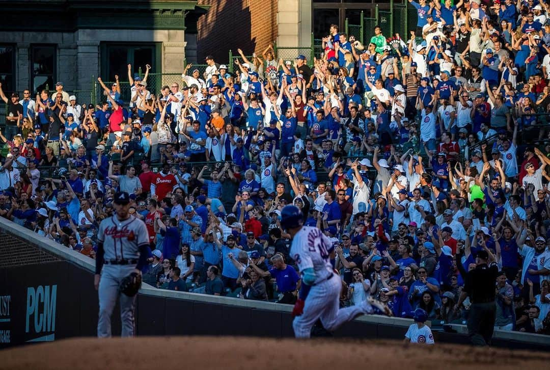 シカゴ・カブスさんのインスタグラム写真 - (シカゴ・カブスInstagram)「#CubsCollection: Fans. During day or night games, home or away series, losing or winning seasons, Cubs fan loyalty runs deep. It spans worldwide and through generations. As Pearl Jam’s Eddie Vedder once said, “…we are not fair-weather but foul-weather fans.” Fans know the meaning of Fly the W, Hey Hey, Holy Cow and Let’s Play Two. They always sing “root, root, root for the Cubbies” and “Go Cubs Go” loud and proud. They help make Wrigley Field the Friendly Confines. And when on the road, it’s a sea of blue as if the Cubs play 162 home games. No matter where they are watching from or how long they have been a fan, their passion for the Cubs doesn’t go unnoticed. Chicago Cubs fans are the best in the league. #EverybodyIn 📸 @sgreenphoto Find more photos on Facebook.com/Cubs」7月17日 6時05分 - cubs