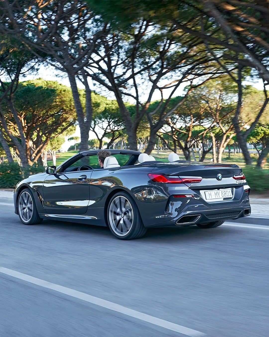 BMWのインスタグラム：「Cruise along in style. THE 8. #THE8 #BMW #8Series #Convertible __ BMW M850i xDrive Convertible: Fuel consumption in l/100 km (combined): 10.0 - 9.9. CO2 emissions in g/km (combined): 229 - 225*; *All performance, fuel consumption and emissions figures are provisional. The values of fuel consumptions, CO2 emissions and energy consumptions shown were determined according to the European Regulation (EC) 715/2007 in the version applicable at the time of type approval. The figures refer to a vehicle with basic configuration in Germany and the range shown considers optional equipment and the different size of wheels and tires available on the selected model. The values of the vehicles are already based on the new WLTP regulation and are translated back into NEDC-equivalent values in order to ensure the comparison between the vehicles. [With respect to these vehicles, for vehicle related taxes or other duties based (at least inter alia) on CO2-emissions the CO2 values may differ to the values stated here.] The CO2 efficiency specifications are determined according to Directive 1999/94/EC and the European Regulation in its current version applicable. The values shown are based on the fuel consumption, CO2 values and energy consumptions according to the NEDC cycle for the classification. For further information about the official fuel consumption and the specific CO2 emission of new passenger cars can be taken out of the „handbook of fuel consumption, the CO2 emission and power consumption of new passenger cars“, which is available at all selling points and at https://www.dat.de/angebote/verlagsprodukte/leitfaden-kraftstoffverbrauch.html.」