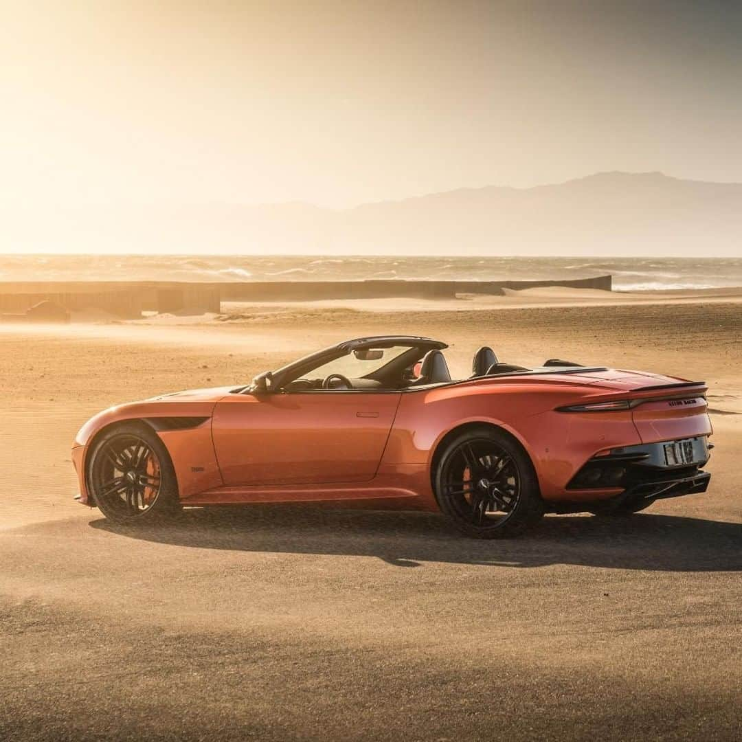 アストンマーチンさんのインスタグラム写真 - (アストンマーチンInstagram)「Behind the front wheels of the Aston Martin DBS Superleggera Volante, the ‘curlicue’ allows air to escape and flow smoothly along the car’s flanks, while the double diffuser at the rear allows air to exit cleanly and neutralise lift as efficiently as possible.  #AstonMartin #DBSSuperleggera #Volante」7月3日 17時00分 - astonmartin