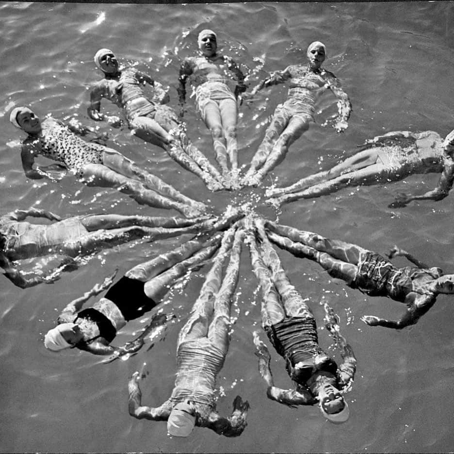 New York Times Fashionさんのインスタグラム写真 - (New York Times FashionInstagram)「On July 8, 1953, almost 66 years ago, the Aquabelles demonstrated a human pinwheel formation at the Aquashow in Flushing Meadow Park. The aquatic show ran for 12 seasons, and that year entertained half a million people. We dug in the New York Times photography archives to find images of swimsuits from 1930s onward. Follow @nytarchives for more archival images. Photograph by Sam Falk/The New York Times」7月4日 23時21分 - nytstyle