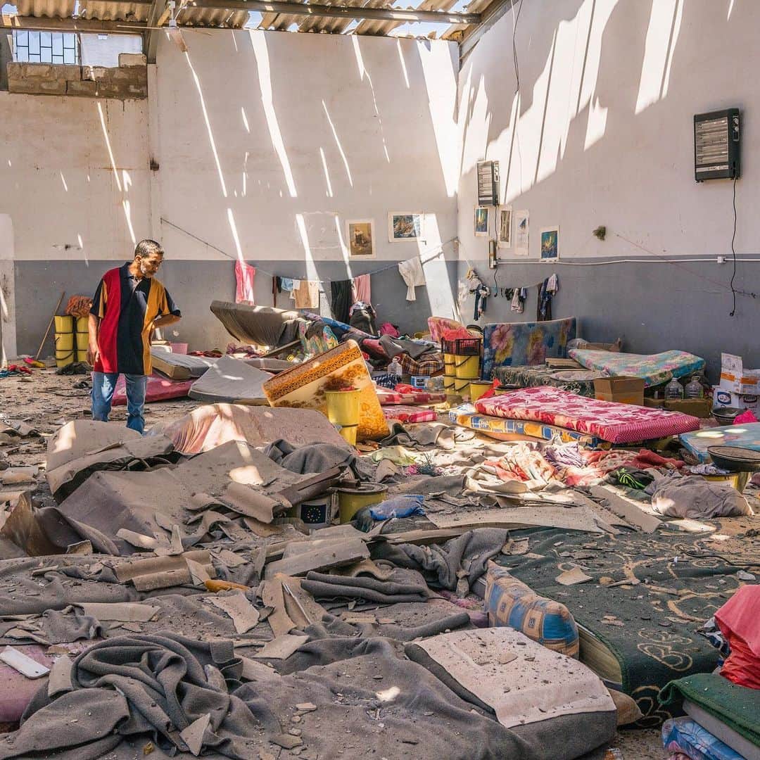 TIME Magazineさんのインスタグラム写真 - (TIME MagazineInstagram)「An early morning airstrike on July 3 killed at least 53 people at a migrant detention center near Tripoli, only two months after the U.N.’s refugee agency had warned that detainees there were at risk. #Libya currently detains thousands of migrants and refugees in government-run facilities under conditions that #humanrights groups say contravene international law. Italian photographer Emanuele Satolli arrived at the Tajoura Detention Center on the outskirts of Libya’s capital hours after the attack destroyed the shelter that housed hundreds of people, mostly from Sub-Saharan Africa. At a hospital ward where some of the wounded had been taken for recovery, families of Libyans with ailments unrelated to the attack thronged the corridors. But in the room that housed the injured migrants, there was nobody in attendance. “That was what struck me the most,” he tells TIME. “They were completely alone.” Read more, and see more pictures, at the link in bio. Photographs by @emanuelesatolli」7月5日 3時31分 - time