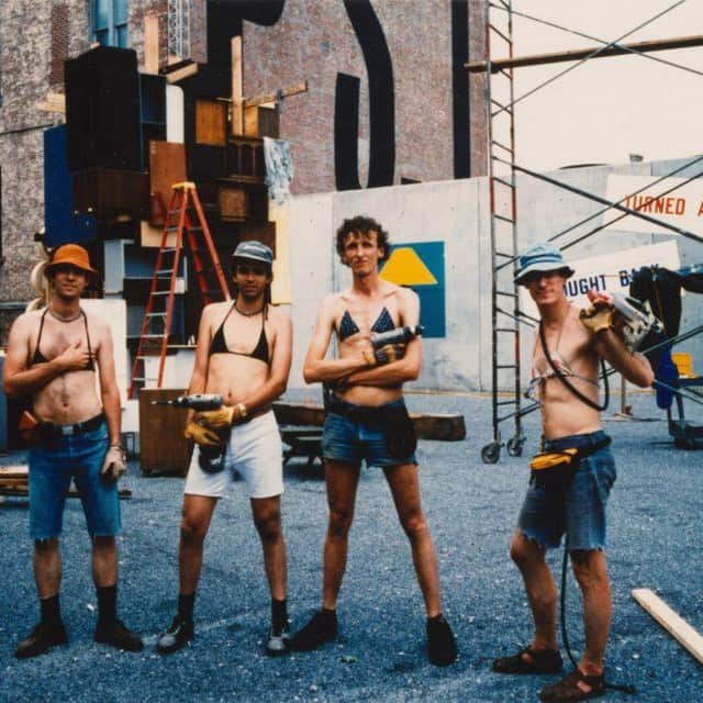 ニューヨーク近代美術館さんのインスタグラム写真 - (ニューヨーク近代美術館Instagram)「Vintage @MoMAPS1 summer style. ☀️👙#TBT ... MoMA PS1 founder Alanna Heis recounts that before the museum reopened in 1997—with guards, consistent opening hours, and an education department— it “was a night museum. It was a club museum. Just getting in was the museum.” The contemporary art museum keeps this spirit alive with Warm Up—a series of summer Saturday concerts, now one of the longest running music programs housed within a museum. See the #WarmUp2019 lineup at moma.org/warmup, and explore this moment in #MoMAhistory at moma.org/momathroughtime (links in bio … [Credit :Gelatin pose in their installation in the courtyard at P.S.1 Contemporary Art Center. Works by Lawrence Weiner and John Baldessari are visible in the background.]」7月5日 4時06分 - themuseumofmodernart