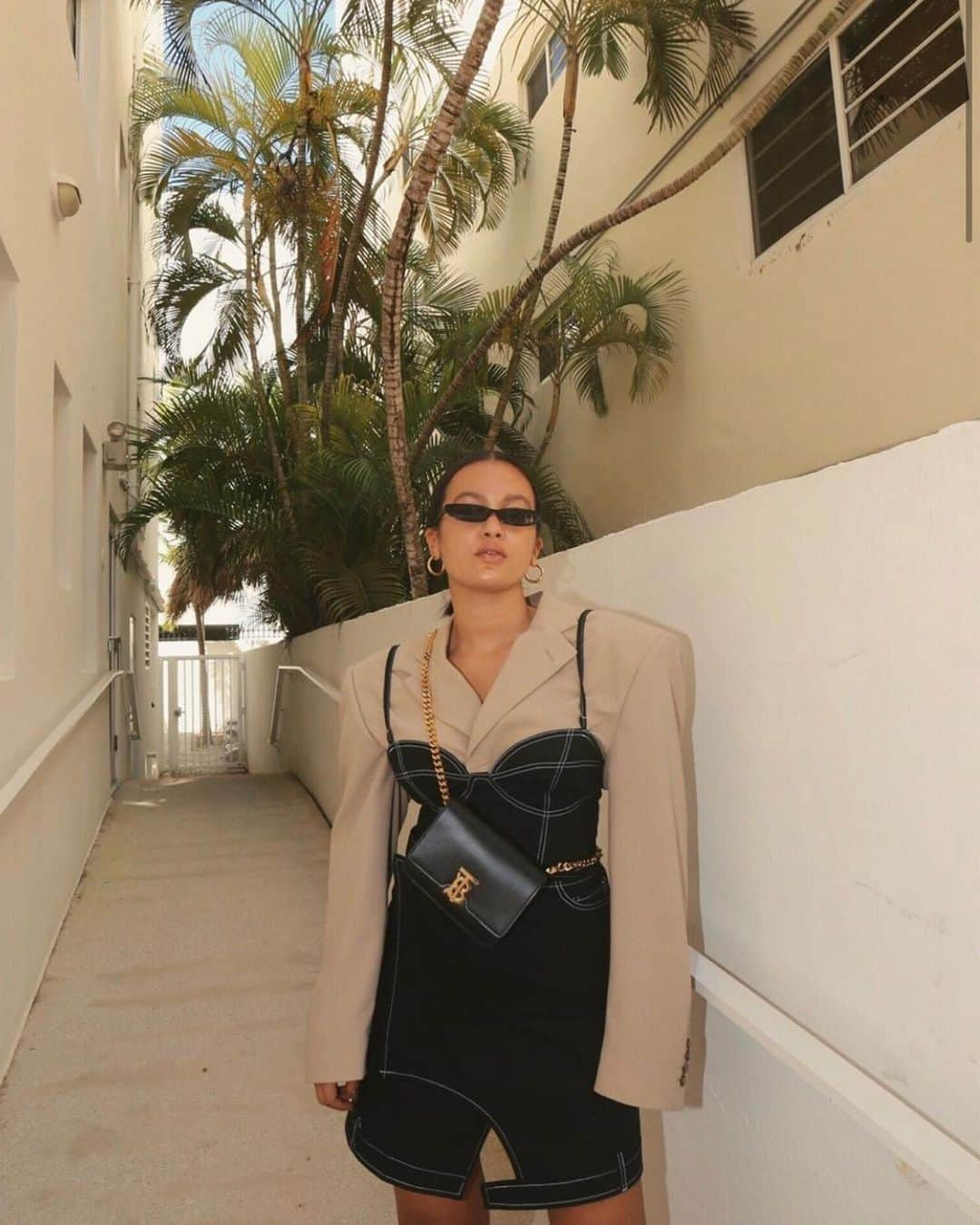 Burberryさんのインスタグラム写真 - (BurberryInstagram)「@oumaymaboumeshouli adorns modern tailoring with the belted leather TB bag at South Beach, Miami . #InBurberry #TheTBbag #ThomasBurberryMonogram #TBRT #BurberryGeneration」7月5日 17時29分 - burberry