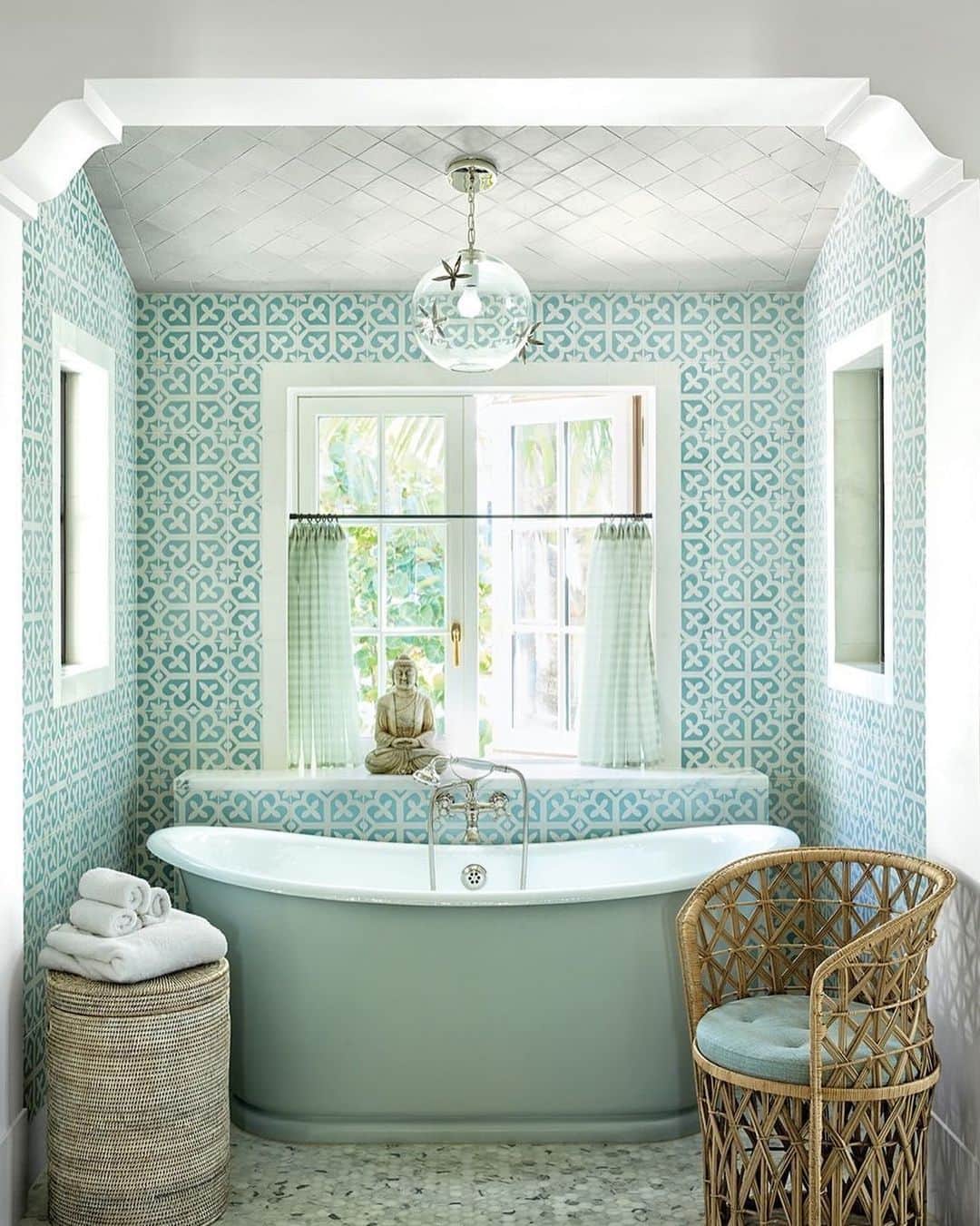 ELLE DECORさんのインスタグラム写真 - (ELLE DECORInstagram)「When designer @tomscheerer was commissioned to design a lofty Palm Beach home, the requested space would have the integrity of older houses without feeling overly grand. The master bath brings ocean vibes inside with its Villa Lagoon wall tiles, pale blue cafe curtains, and vintage rattan chair. Click the link in bio for the full home tour, as seen in our July/August 2019 issue. Photo: @francescolagnese」7月5日 10時28分 - elledecor