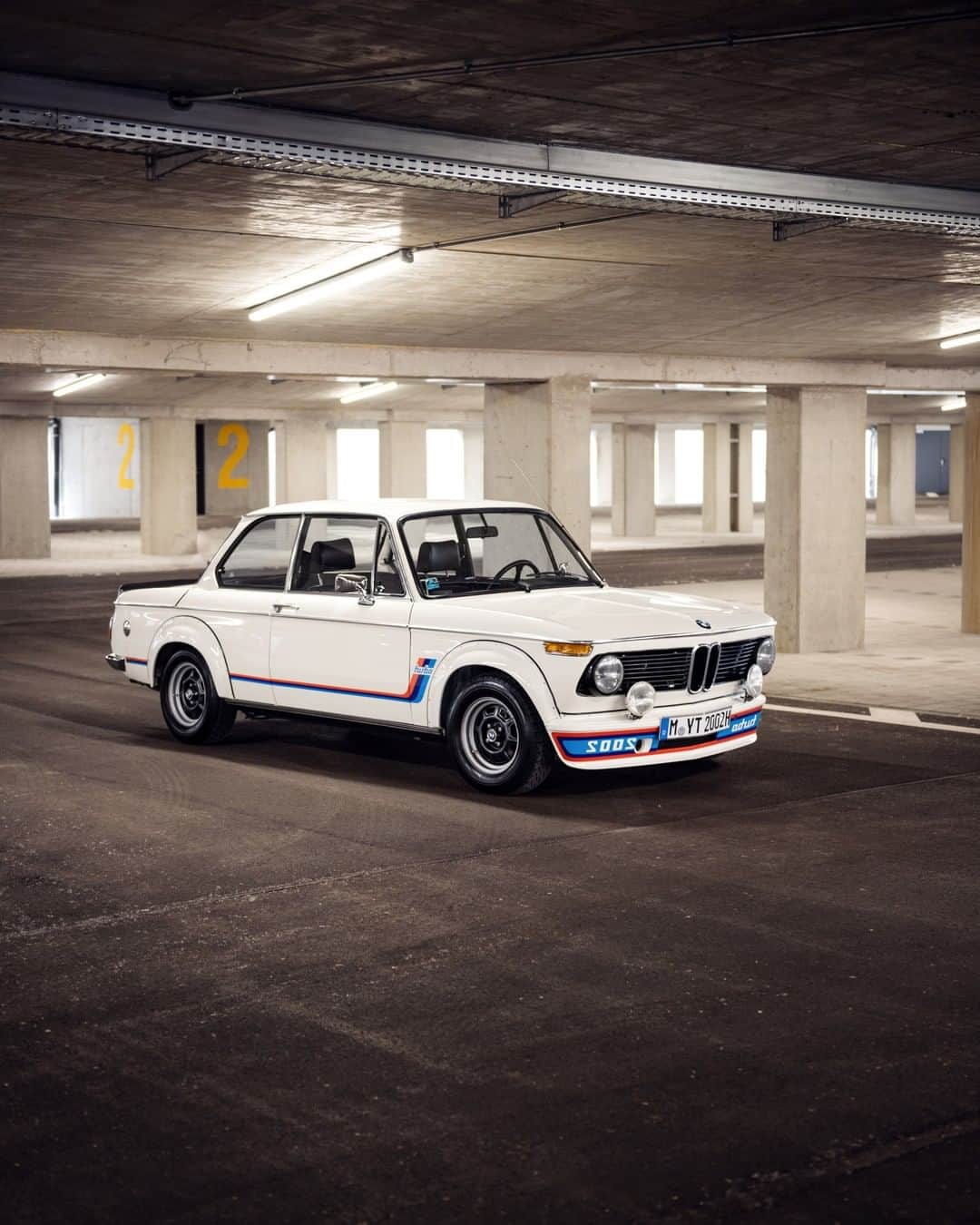 BMWのインスタグラム：「A young, thrill-seeker soul from the past. The BMW 2002 Turbo. #BMWrepost @lumafoto #BMW #bmw2002 @bmwclassic」