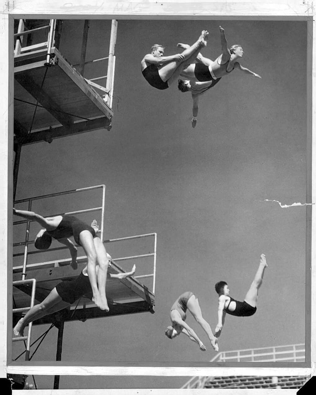 New York Times Fashionさんのインスタグラム写真 - (New York Times FashionInstagram)「Ahead of the summer, we dug into our photo archives. Here, on April 7, 1932, divers at the Los Angeles Athletic Club soar through the air as they officially open the new Olympic swimming stadium. Swipe up or link in bio to read a history of the swimsuit. Follow @nytarchives for more archival photography.」7月7日 0時23分 - nytstyle