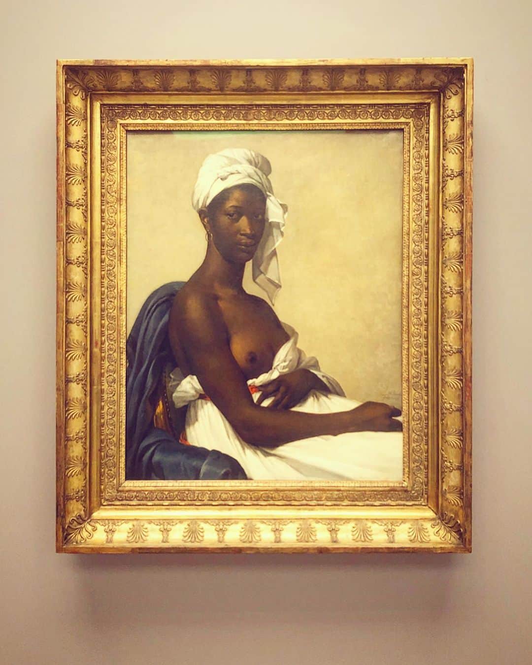 デレク・ブラスバーグさんのインスタグラム写真 - (デレク・ブラスバーグInstagram)「What’s the best art show in Paris? That’s easy. “Black Models: From Géricault to Matisse,” which is both a chronological survey of black figures in French painting from the revolution to the mid-twentieth century, and a radical modernization of how we view the models. Why? The museum literally changed the titles of the paintings to respectfully acknowledge the black subjects that feature them. So, (first pic) Marie-Guillemine Benoist’s 1800 painting is now “Portrait of Madeline,” which was formerly “Portrait of a Black Woman.” (It had another title before that, but I ain’t gonna say that word.) And (second pic) a painting from 1827 by Eugène Delacroix is listed as “Portrait of a Woman with Blue Turban,” updating its original title, which used more archaic vocabulary. Why is this such a big deal? As the art historian Anne Higonnet pointed out in the catalogue, what if Mona Lisa was titled “Portrait of a white woman”? That struck me. The show’s original concept came from Denise Durrell’s 2013 doctorate thesis at Columbia University, which was inspired by paintings that had heavily researched white models but neglected black figures, most notably (third pic) Édouard Manet’s “Olympia” (1863). This painting, which is part of the museum’s permanent collection, is the centerpiece of this exhibit. However, next to it is the part I found most moving in the whole show: Manet’s diary from the 1860’s, which finally reveals the black model’s real name: Laure. None of these pictures are new — and many of them I’ve seen before — but this show positioned them in a new light, and for that I am grateful. At a time when race relations seem on the verge of regression (both in France and the US), renaming these portraits left me with a feeling of dignity and gratitude. It’s up till July 21st!」7月7日 4時12分 - derekblasberg