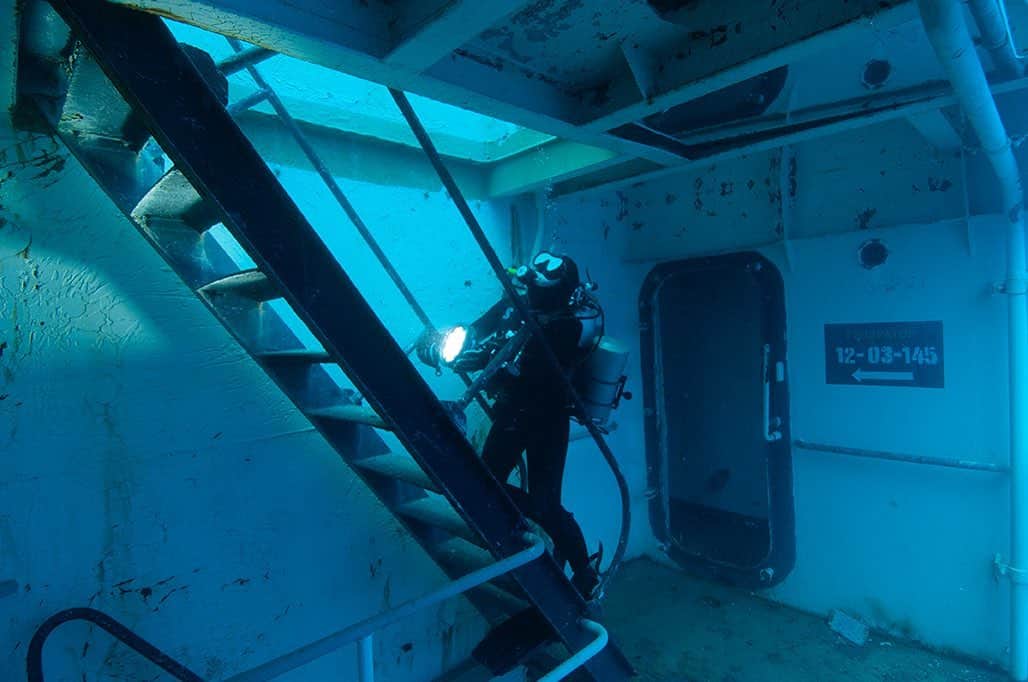 National Geographic Creativeさんのインスタグラム写真 - (National Geographic CreativeInstagram)「Photo by @daviddoubilet | A diver inspects a ship that was sunk to create an artificial reef in Key West, Florida. #Underwater #Florida #Diving」7月8日 2時53分 - natgeointhefield