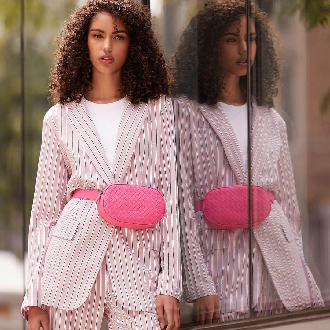 Saks Fifth Avenueさんのインスタグラム写真 - (Saks Fifth AvenueInstagram)「POWER PINKS: Mix and match similar hues of the shade, like this neon @bottegaveneta belt bag and pinstripe suit from @tibi. #SaksStyle」7月8日 7時02分 - saks