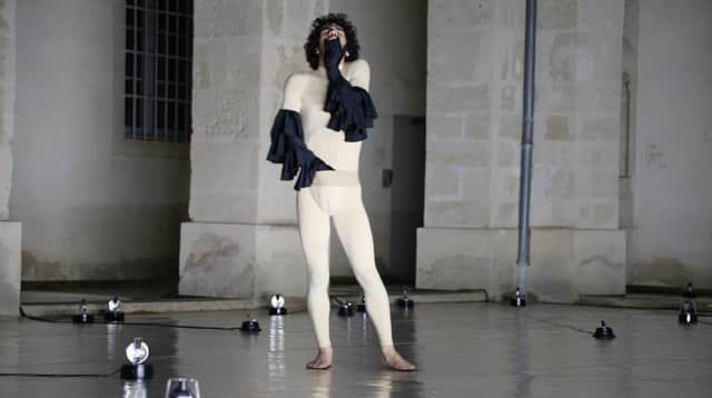 ジャンポールレスパナールのインスタグラム：「. @regisbadel enjoying his “sixty nine moment” while counting to the infinite. I made this bodysuit in reference to traditional dance ballet costumes mixing modern suspensoirs and minstrel character. This costume is a reflection / evolution of the costume that Regis was wearing in 10.000 gestures :) Opening Infini on July 11th at Athens Epidaurus Festival #thestorybehindtheprocess」
