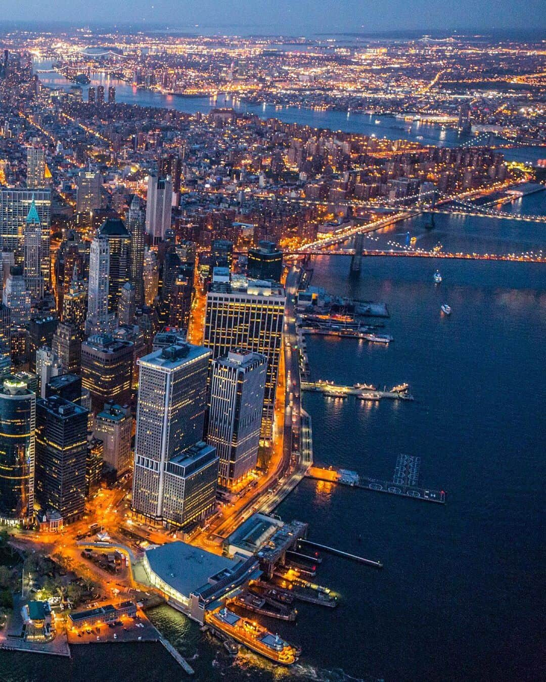 National Geographic Travelさんのインスタグラム写真 - (National Geographic TravelInstagram)「Photo by George Steinmetz @geosteinmetz | A sparkling New York City at twilight. When I hear people complaining about all the new buildings going up in Manhattan, it reminds me what O. Henry noted in 1908: “It’ll be a great place if they ever finish it.” To view more of our world from above, follow me, @geosteinmetz.」7月8日 22時02分 - natgeotravel