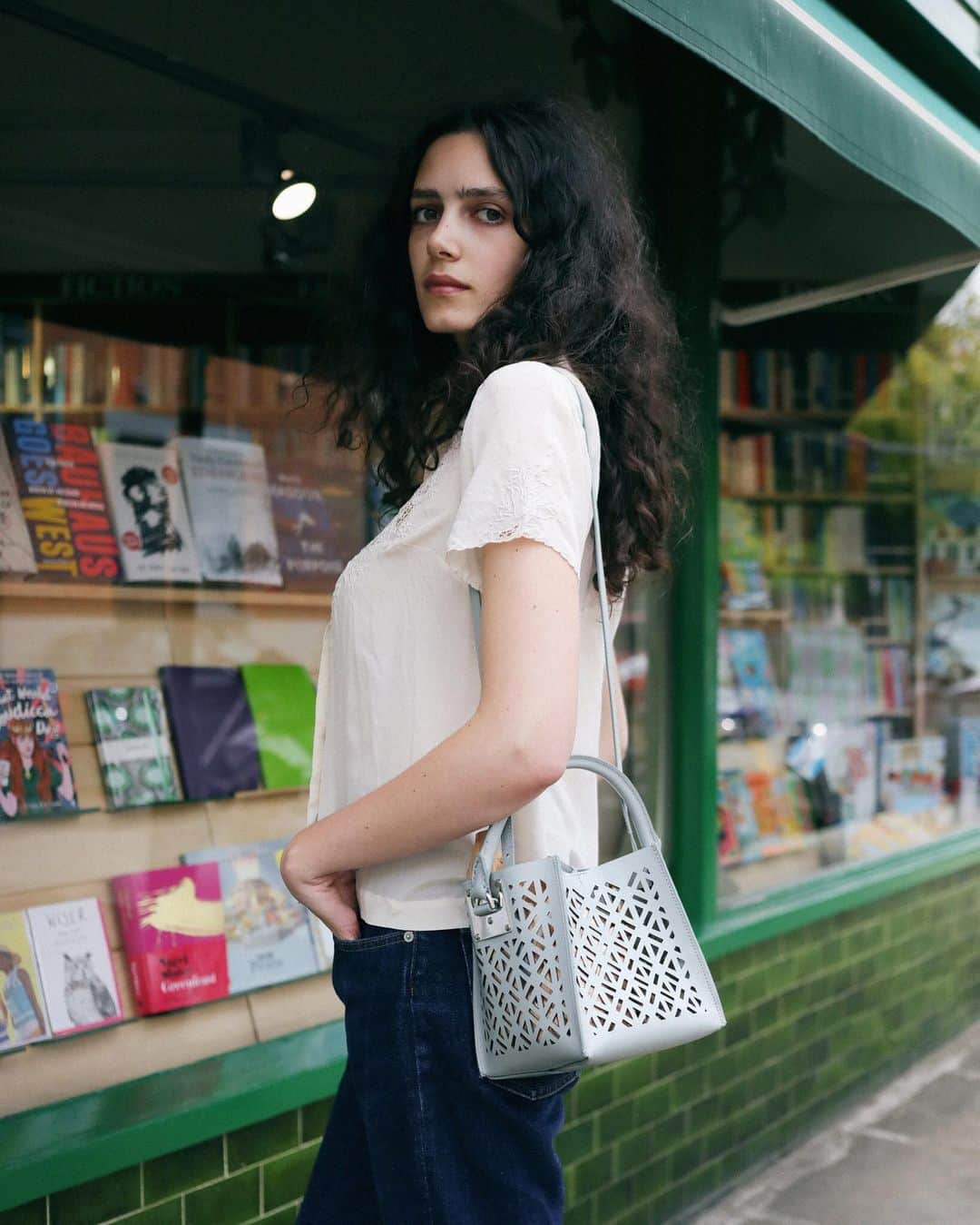 Sophie Hulmeのインスタグラム：「Gorgeous wordsmith @rosalindjana out and about with this delight from our new collection - the laser cut Albion Cube... 💙」