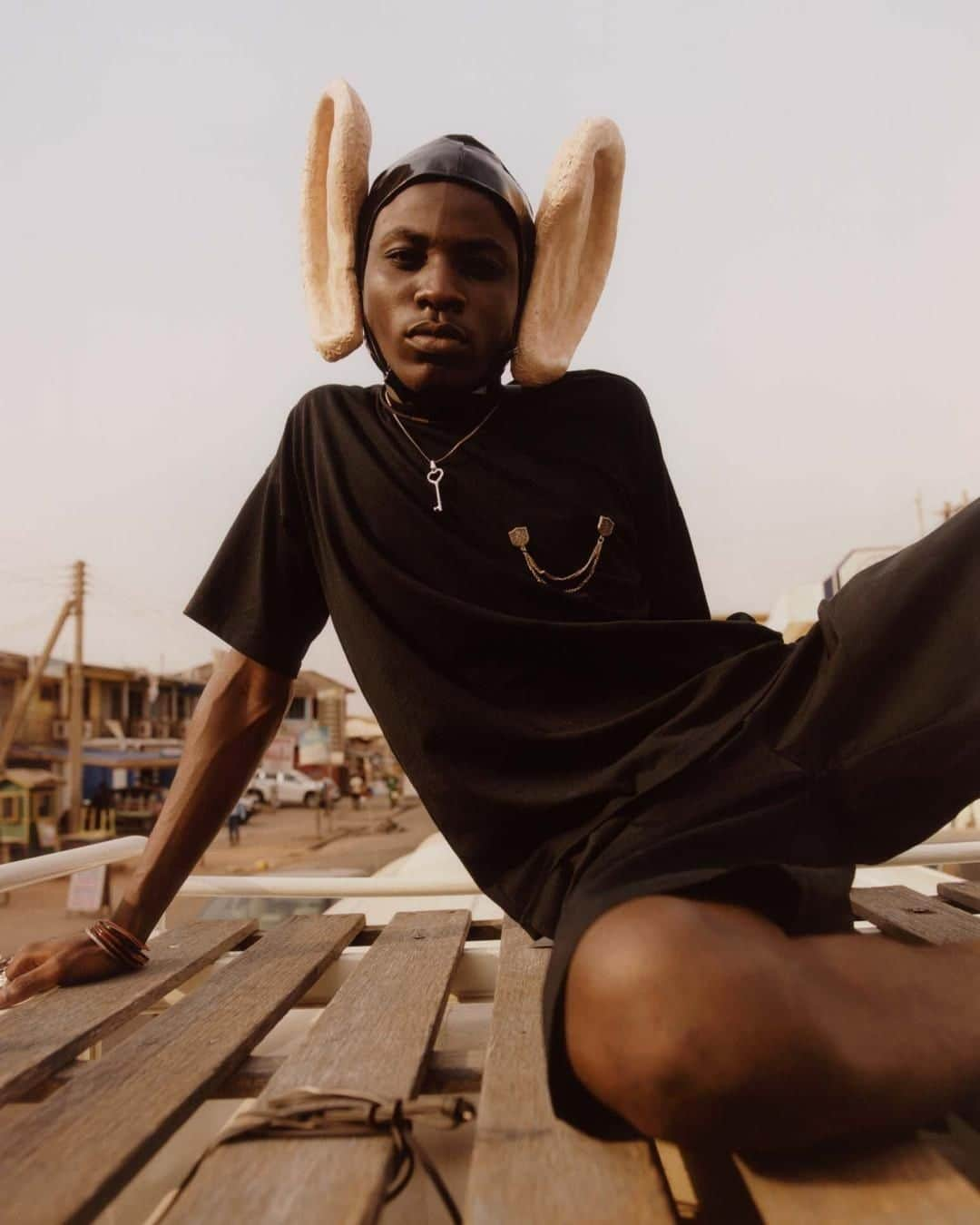 i-Dさんのインスタグラム写真 - (i-DInstagram)「Are you all ears? Good.👂⁣ ⁣ For The Voice of a Generation Issue, photographer Kyle Weeks and i-D's Senior Fashion Editor at Large Ib Kamara team up to celebrate the raw and authentic style of Accra, Ghana. 🇬🇭⁣ ⁣ And we just posted the full shoot on i-D.co for your viewing pleasure, link in bio. ⬆⁣ ⁣ [The Voice of a Generation Issue, no. 356, Summer 2019.]⁣ .⁣ .⁣ .⁣ Photography @_kyleweeks_⁣ Styling @ibkamara⁣ @jude.lartey wears top and shorts #BottegaVeneta. Bunny ears @nasirmazhar . necklace model’s own. #Accra #Ghana #IbKamara #KyleWeeks」7月9日 23時10分 - i_d