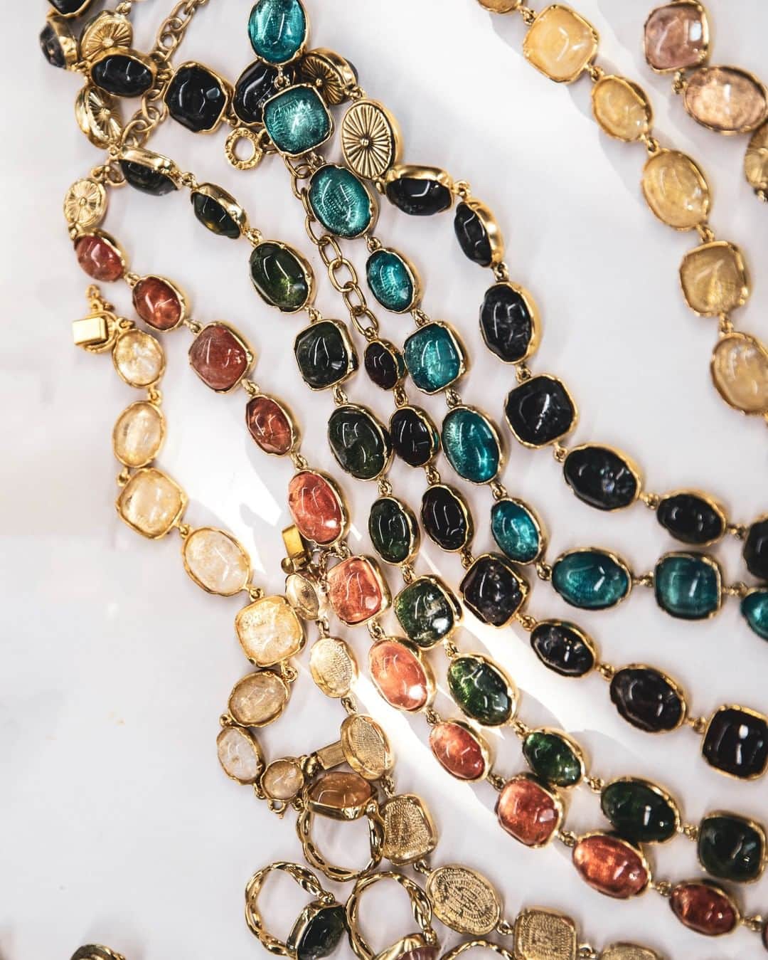 グーセンス パリのインスタグラム：「Enlighten"Cabochons" necklaces in our workshop. . . ##📸 by @mathieu.bonnin . . #Goossens #cabochons #colorful #yellow #gold #brass #rockcrystal #summer #necklace」