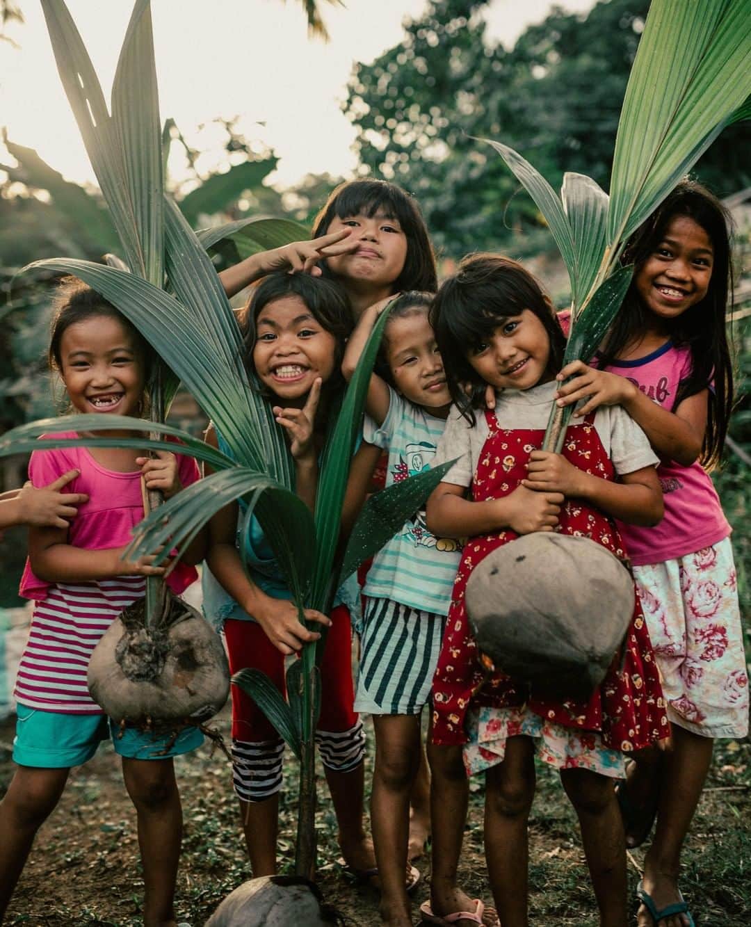 Vita Coco Coconut Waterのインスタグラム：「Smiles as big as the coconuts! Captured at one of the classrooms we built in the Philippines.」
