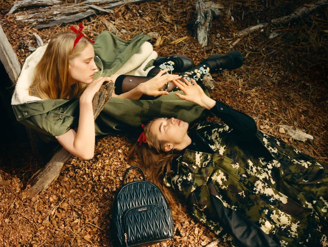 Miu Miuさんのインスタグラム写真 - (Miu MiuInstagram)「Camouflaged in camouflage, laid against rural panoramas of field and forest illuminated by the first blush of summer.  #MiuMiu introduces the new #MiuMiuFW19 campaign by @EddieWrey. Discover the full campaign via link in bio.  Styling and Art Direction by @KEGrand. Featuring: @AbbyChampion and @MeghanRoche」7月11日 4時33分 - miumiu
