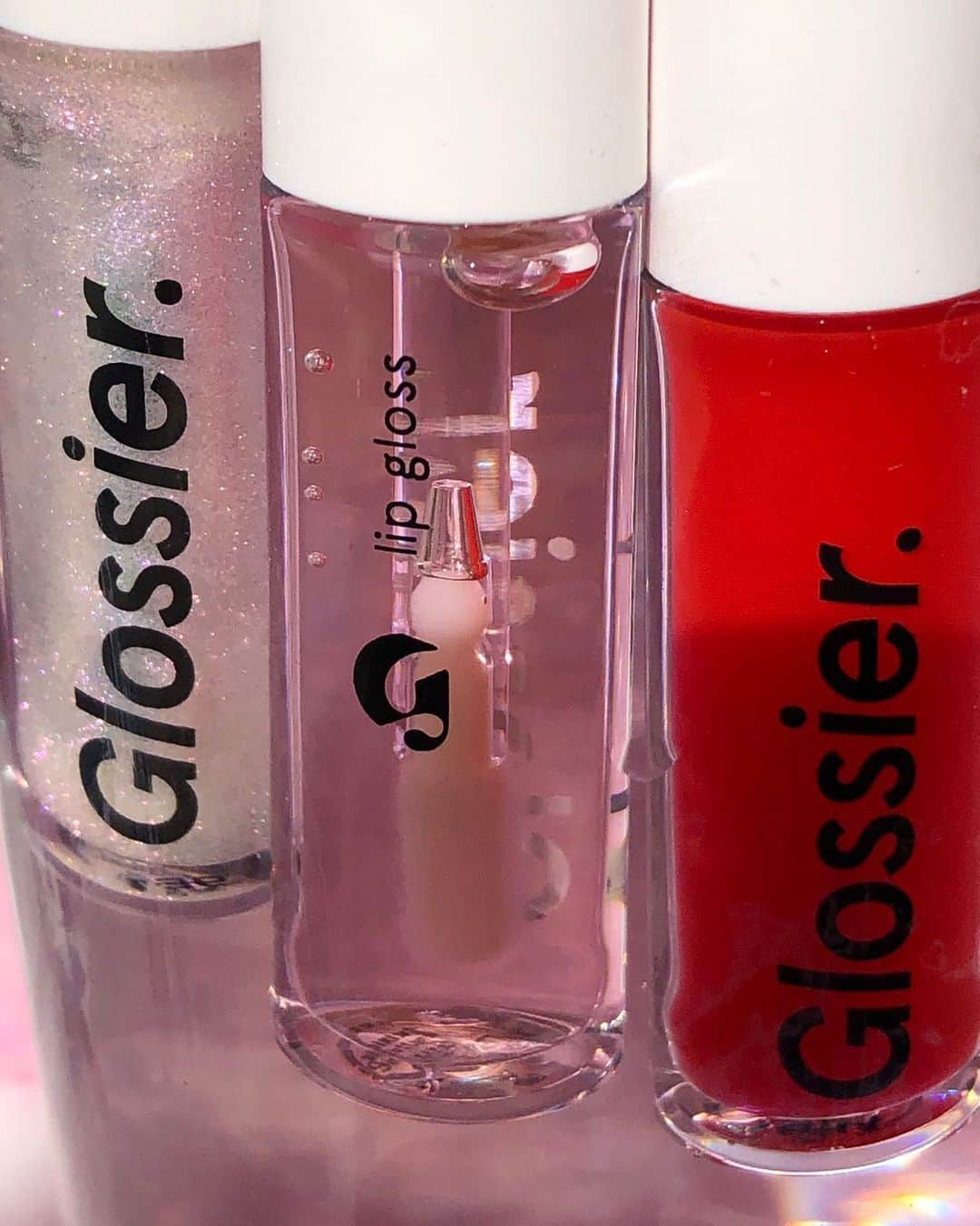 Glossierさんのインスタグラム写真 - (GlossierInstagram)「Three ways to gloss ✨ . (L to R Lip Gloss in Holographic, Clear, + Red)」7月11日 5時22分 - glossier