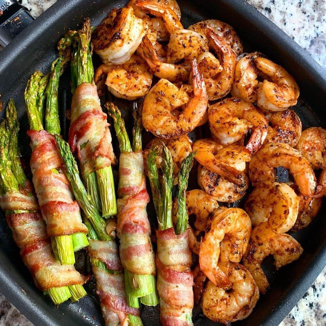 Flavorgod Seasoningsさんのインスタグラム写真 - (Flavorgod SeasoningsInstagram)「Grilled Sweet and Tangy Shrimp with Bacon Wrapped Asparagus⁠ .⁠ By @keto_rebel⁠ .⁠ Made with:⁠ 👉 #flavorgod Fiesta Sweet & Tangy ⁠ -⁠ KETO Seasonings on Sale here ⬇️⁠ Click the link in the bio -> @flavorgod | www.flavorgod.com⁠ .⁠ I tossed the shrimp with a little avocado oil and generously coated with @flavorgod Fiesta Sweet and Tangy seasoning. I cooked the shrimp in a grill pan for 5-6 mins over medium heat.⁠ ⠀⁠ The bacon wrapped asparagus were cooked in the air fryer.⁠ -⁠ Flavor God Seasonings are:⁠ 💥ZERO CALORIES PER SERVING⁠ 🔥0 SUGAR PER SERVING ⁠ 💥GLUTEN FREE⁠ 🔥KETO FRIENDLY⁠ 💥PALEO FRIENDLY⁠ -⁠ -⁠ #food #foodie #flavorgod #seasonings #glutenfree #mealprep  #keto #paleo #vegan #kosher #breakfast #lunch #dinner #yummy #delicious #foodporn」7月12日 9時30分 - flavorgod