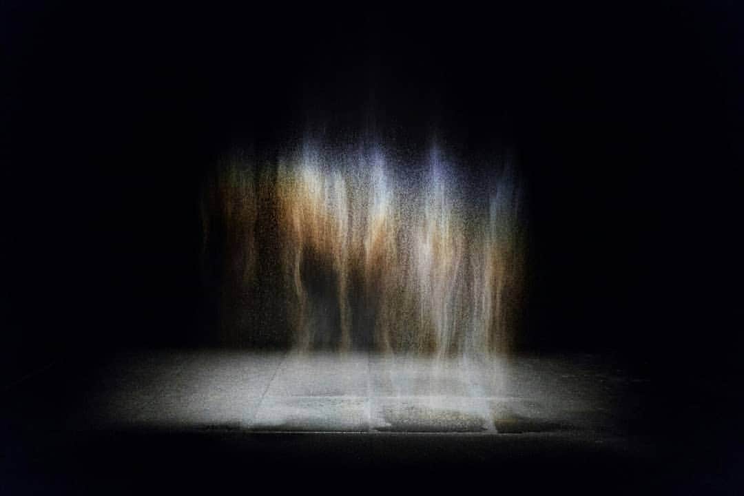 のインスタグラム：「#OlafurEliasson has changed what it means to be an artist. Through the 90s and early 2000s, Eliasson made work that recreated natural phenomena. Take 1993’s Beauty for example, a fine mist that you can walk in and out of. From some angles you can see a rainbow in the mist, and from others, the colours disappear.  In this piece, as in others, Eliasson wanted to recreate something he’d witnessed first-hand in Iceland, but he didn’t want to hide how it was made. 'He calls it seeing yourself sensing' Tate curator Mark Godfrey says. 'You'd not just be having an experience, but conscious of having that experience. You would be made self-aware by the set-up of his work, of that experience of looking... Eliasson is interested in the connection between an experience that might take place in a gallery and the way it might affect your behaviour when you leave that gallery, in relation to the world around you.' We've teamed up with WePresent to hear more from Mark about the artist's multi-sensory practice. Click the link in today's bio for the full read. @studioolafureliasson」