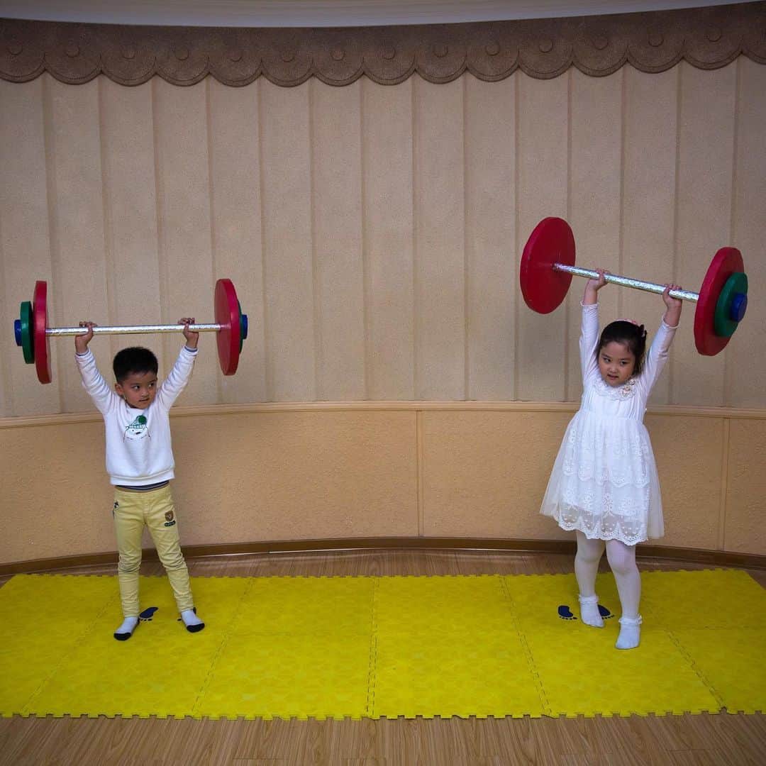 thephotosocietyさんのインスタグラム写真 - (thephotosocietyInstagram)「Photo by David Guttenfelder @dguttenfelder | North Korean children play with toy exercise equipment at a recreational area inside the Kyongsang Kindergarten in Pyongyang.  Please follow me, @dguttenfelder, for an inside look at North Korea, where I have been traveling and photographing for the past 19 years.」7月12日 11時29分 - thephotosociety