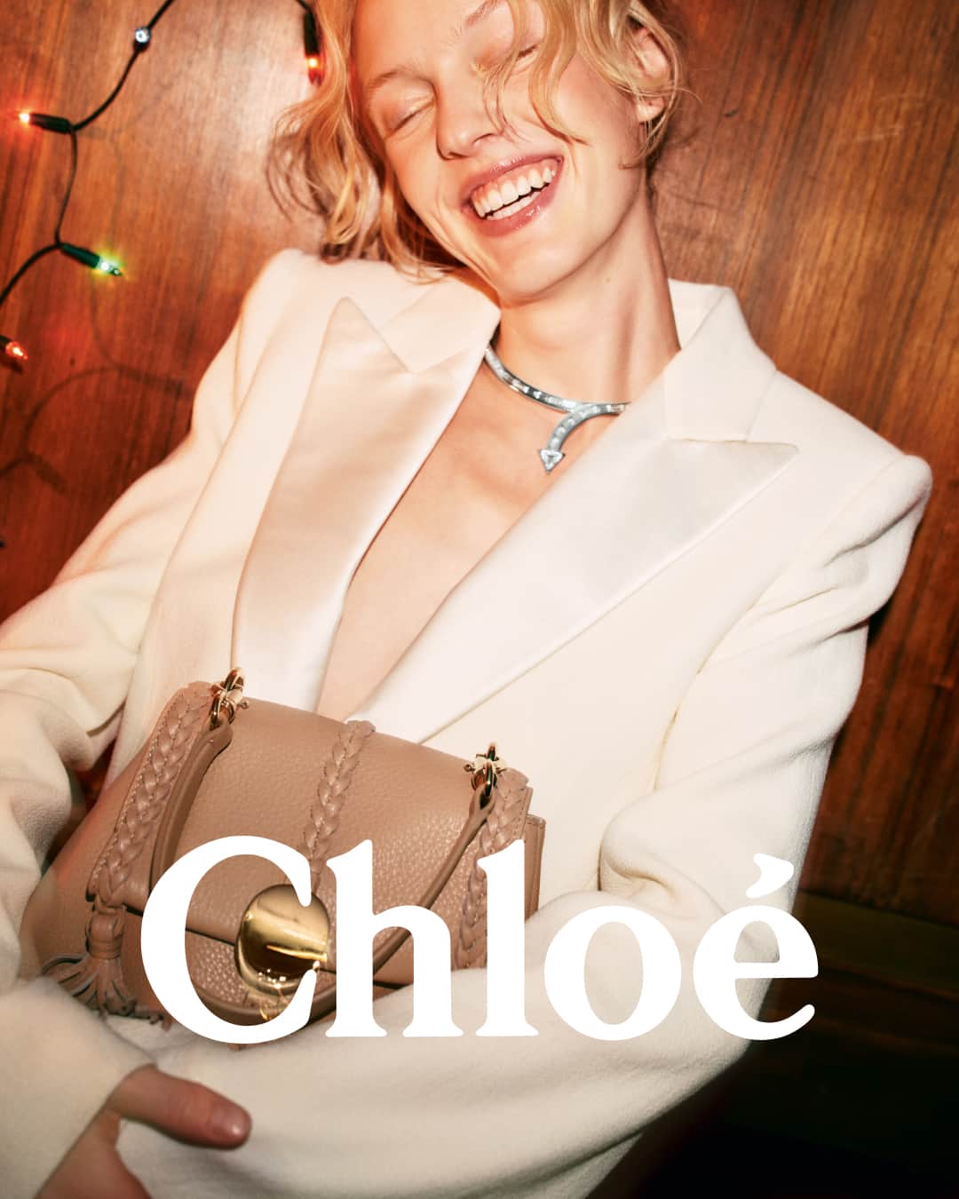 Chloéのインスタグラム：「Crafted from smooth-grained leather complete with signature coin closure, the Penelope bag carried here by @boy.ewald is a centrepiece of the Chloé Festive collection’s gift edit.」