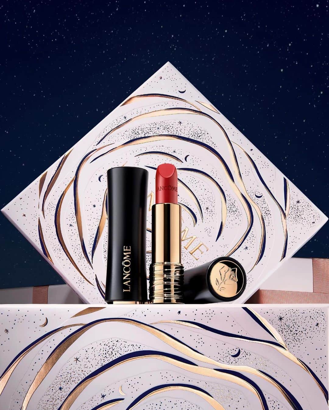 Lancôme Officialのインスタグラム：「Sublimate your natural radiance with Lancôme’s makeup essentials: Teint Idole Ultra Wear foundation, Hypnôse mascara and L’Absolu Rouge Cream in a beautiful red shade.  #Lancome #LancomexLouvre #Holiday23」